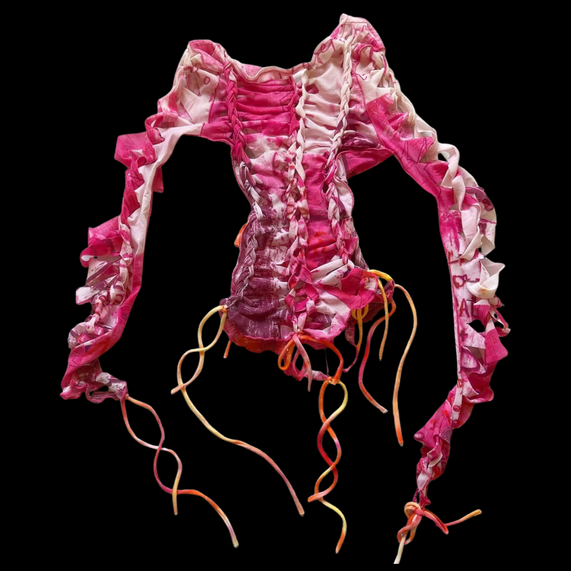 Pink and white tie-dye fabric with ruched and braided details, tied with multicolored strings, laid flat on a black background.