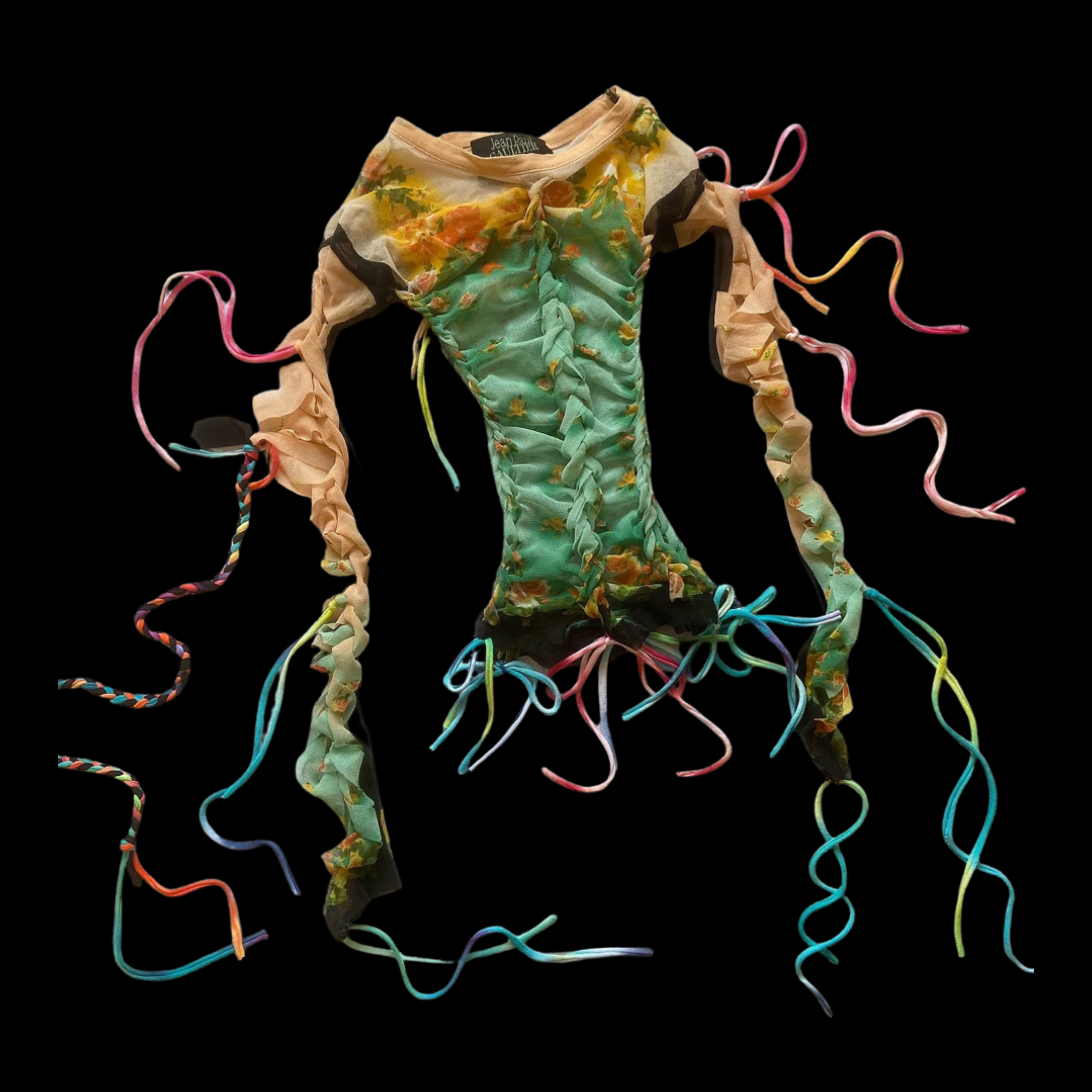 A colorful dress with floral patterns and multicolored ribbon-like strings hanging from the sleeves and hem, displayed against a black background.