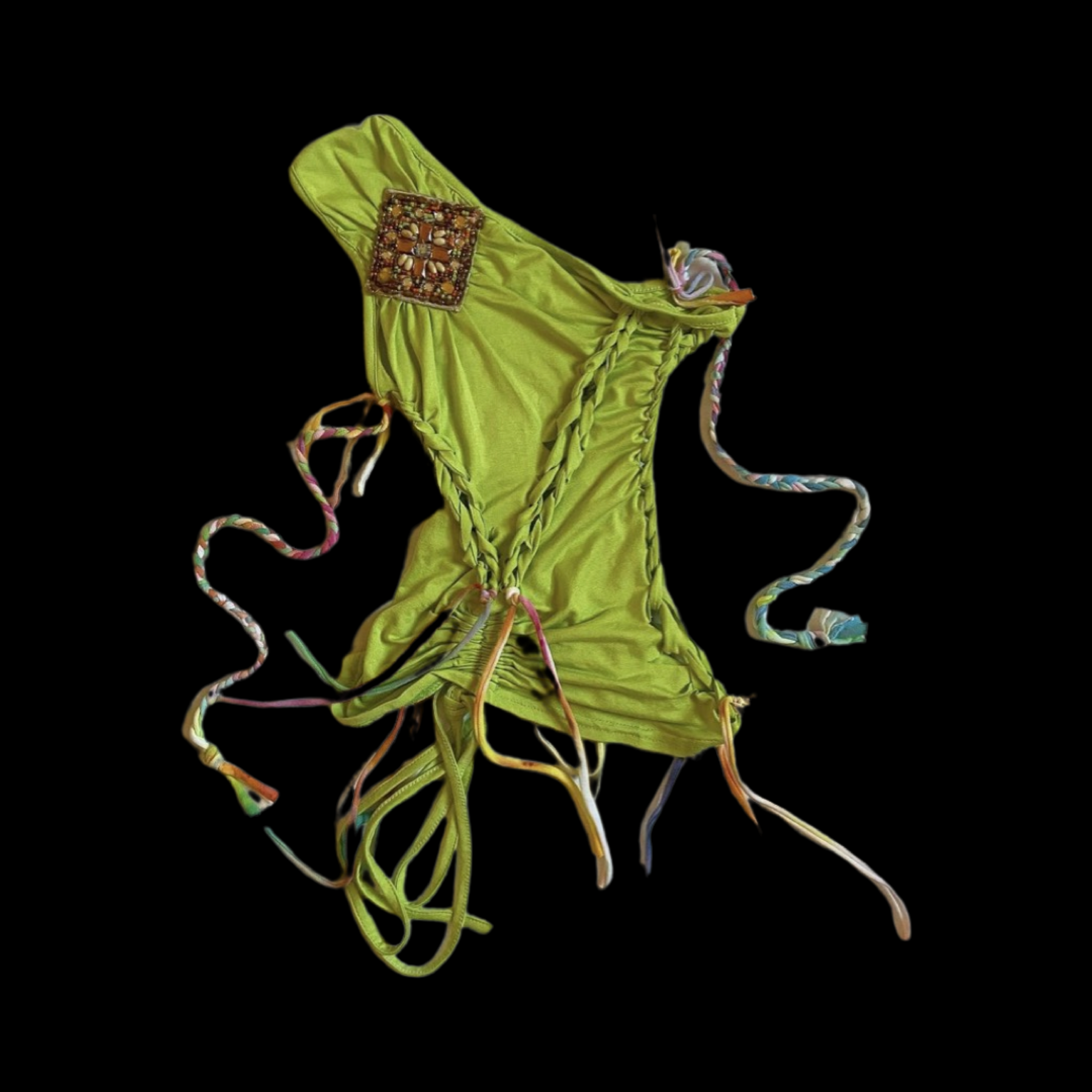 A bright yellowish-green halter top with colorful braided straps and decorative beadwork on the chest, placed against a black background.