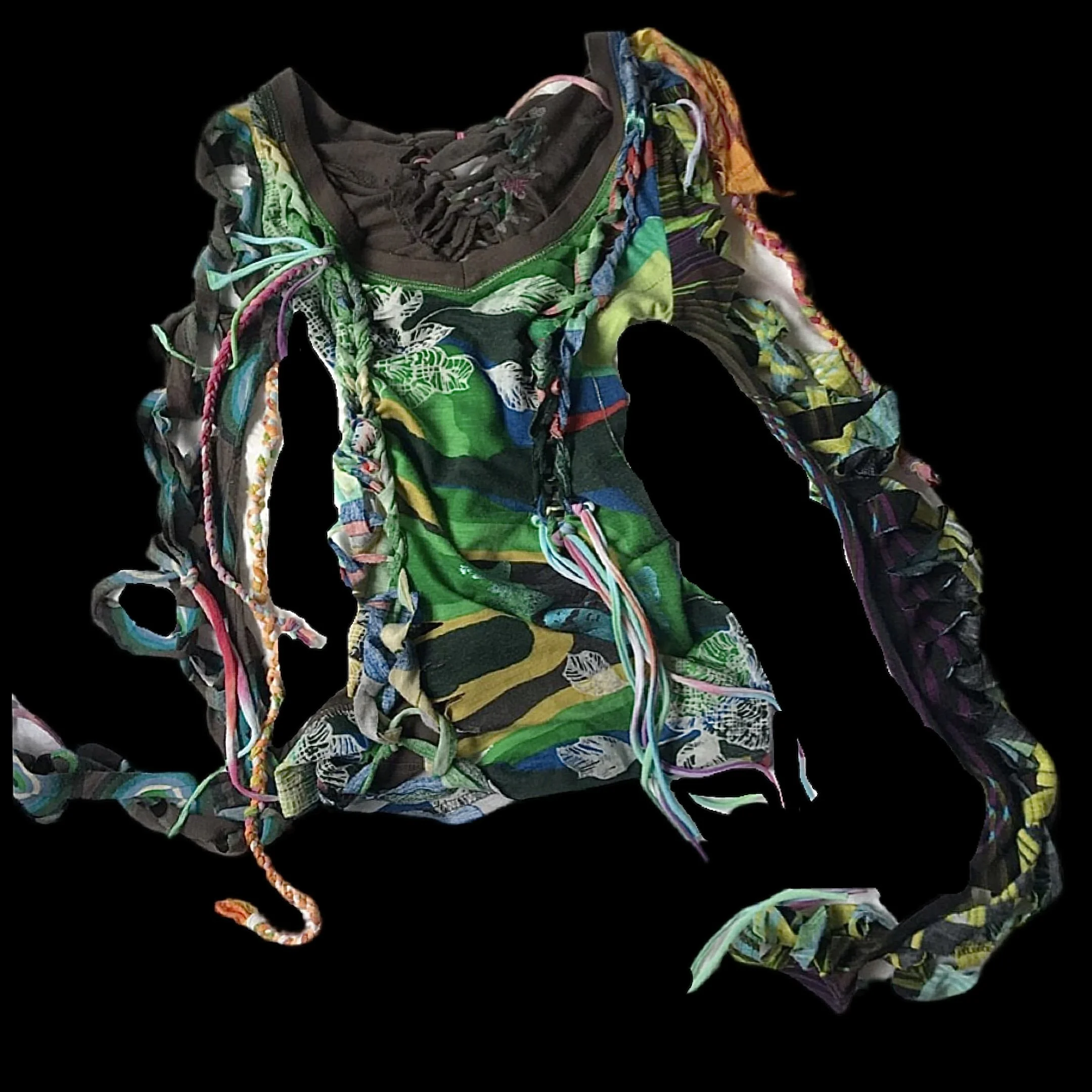 Colorful, patterned, crumpled fabric with various textures and ties, resembling a fabric sculpture or an abstract piece, set against a black background.