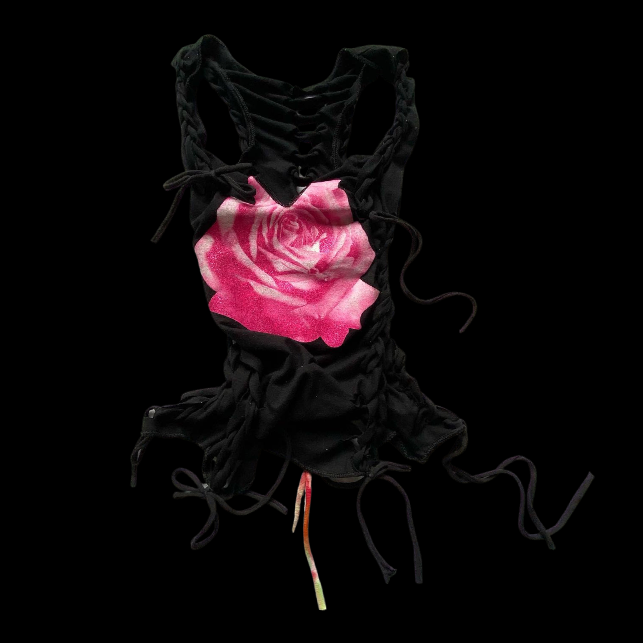 Black clothing with a pink rose graphic, tied with adjustable strings against a black background.