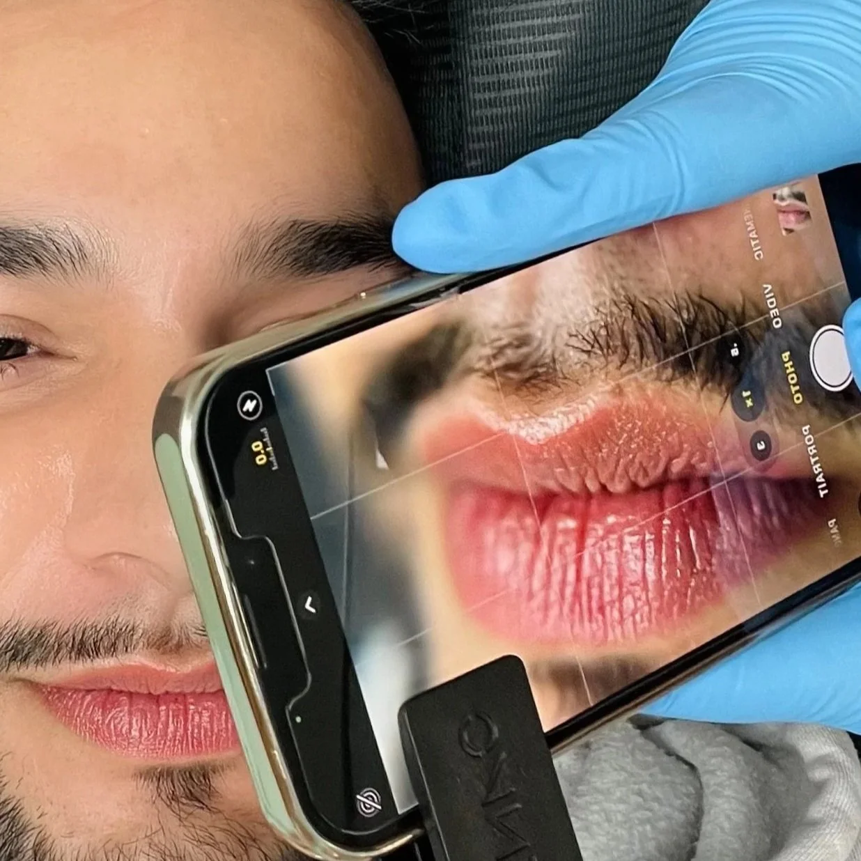 Image of a lip blush tattoo on a male client for inkedizzy