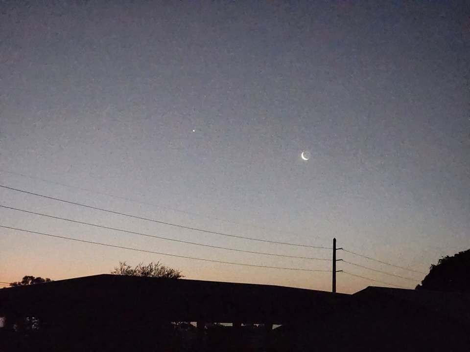 The moon and Jupiter over the arena this morning!