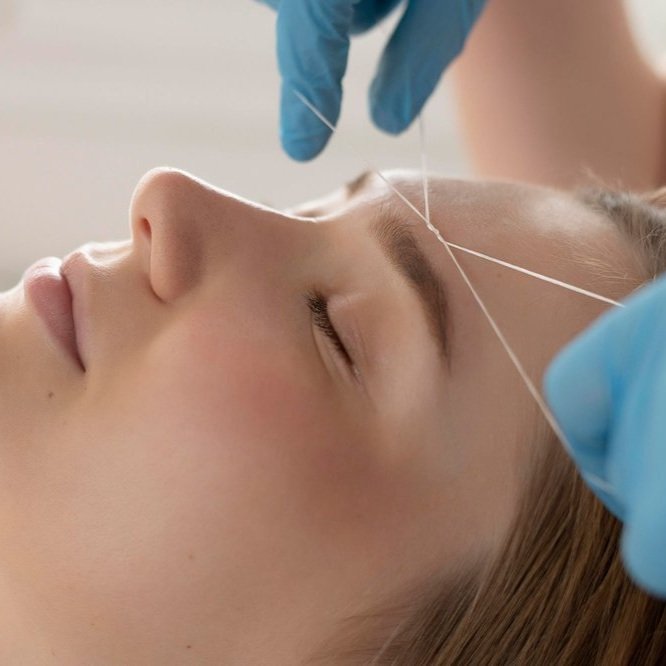 close-up-of-young-woman-getting-an-eyebrow-treatment+%281%29.jpg
