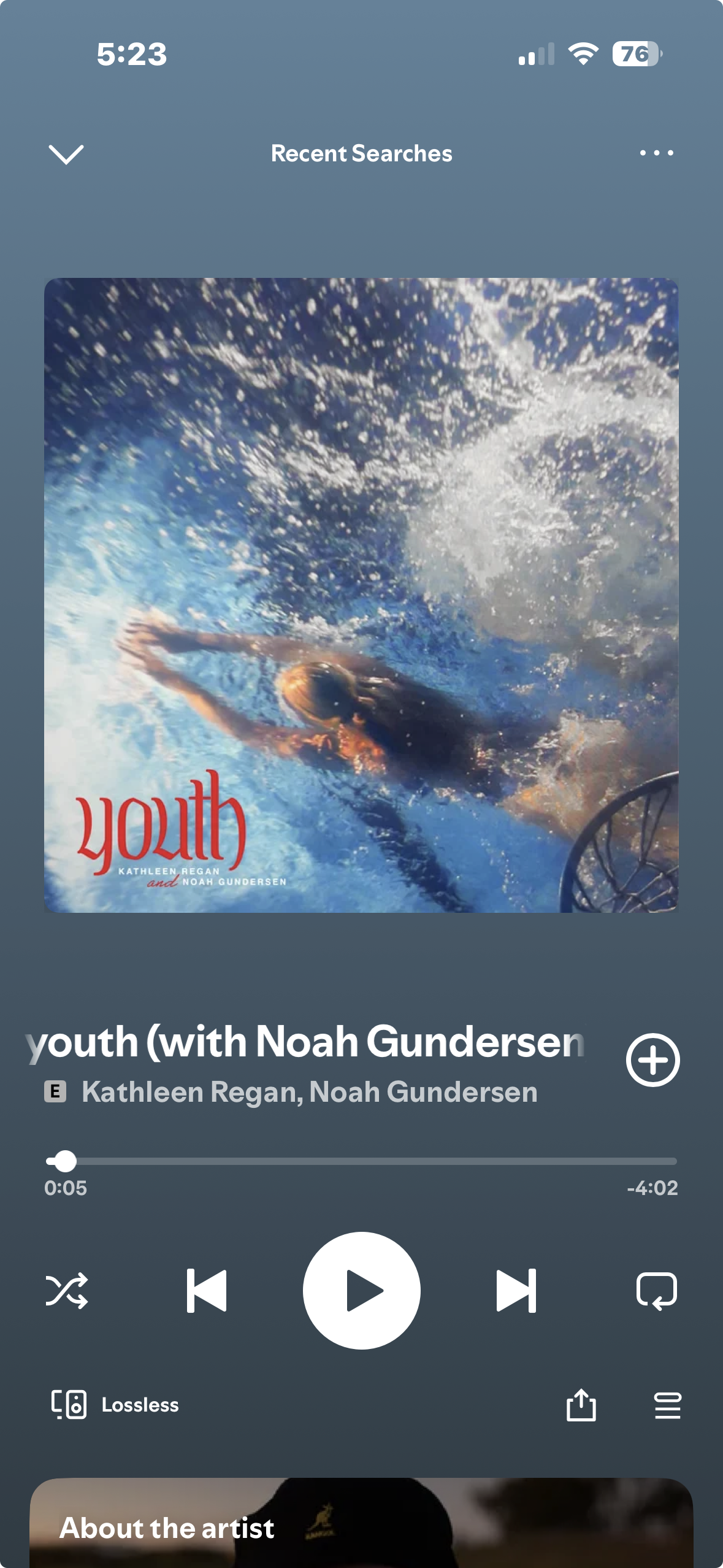 A woman swimming underwater in a pool with water splashing around her, wearing a swim cap and goggles, with the word "youth" and the names of Kathleen Regan and Noah Gundersen on the bottom left.