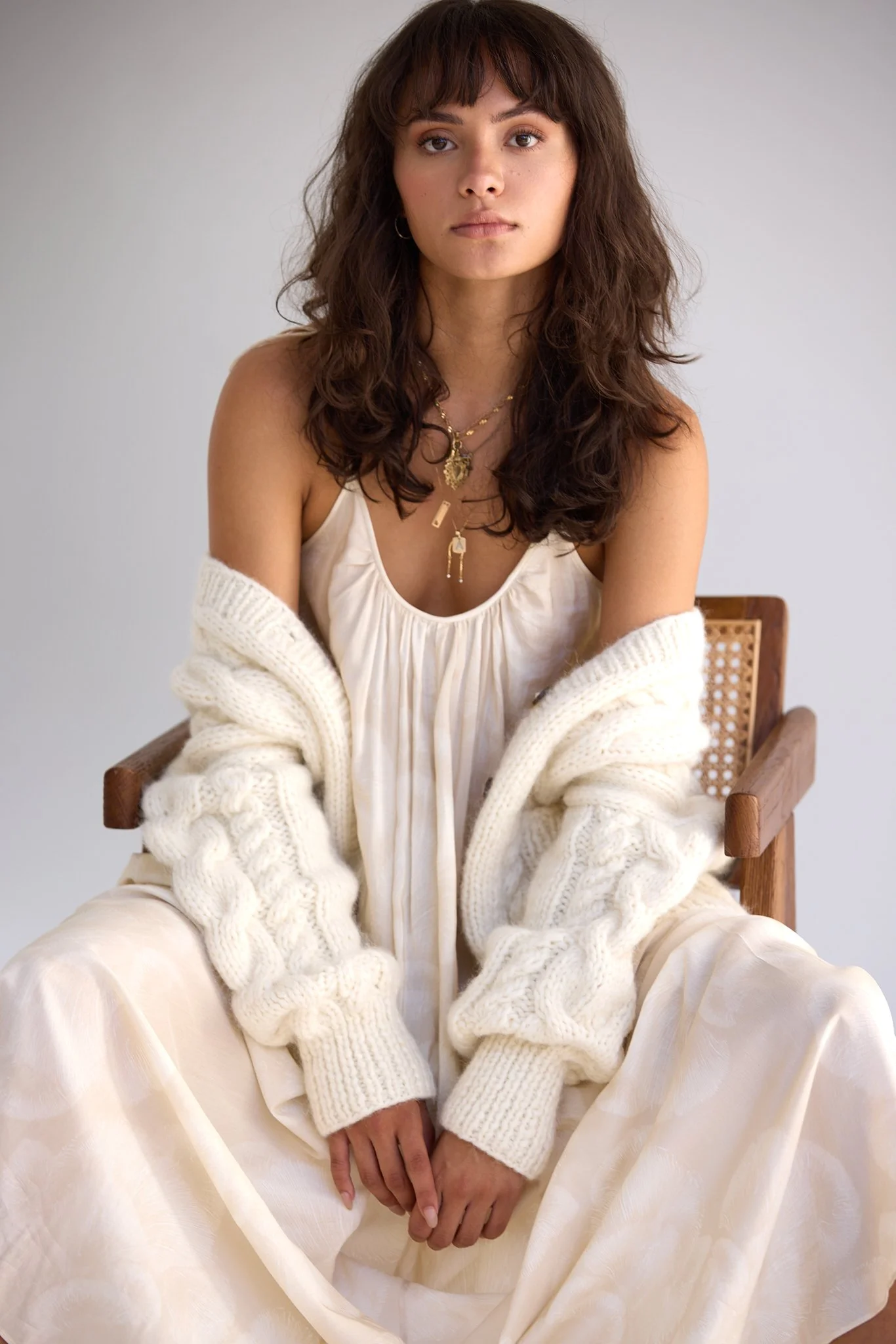 Studio fashion lookbook image highlighting knitwear and natural beauty