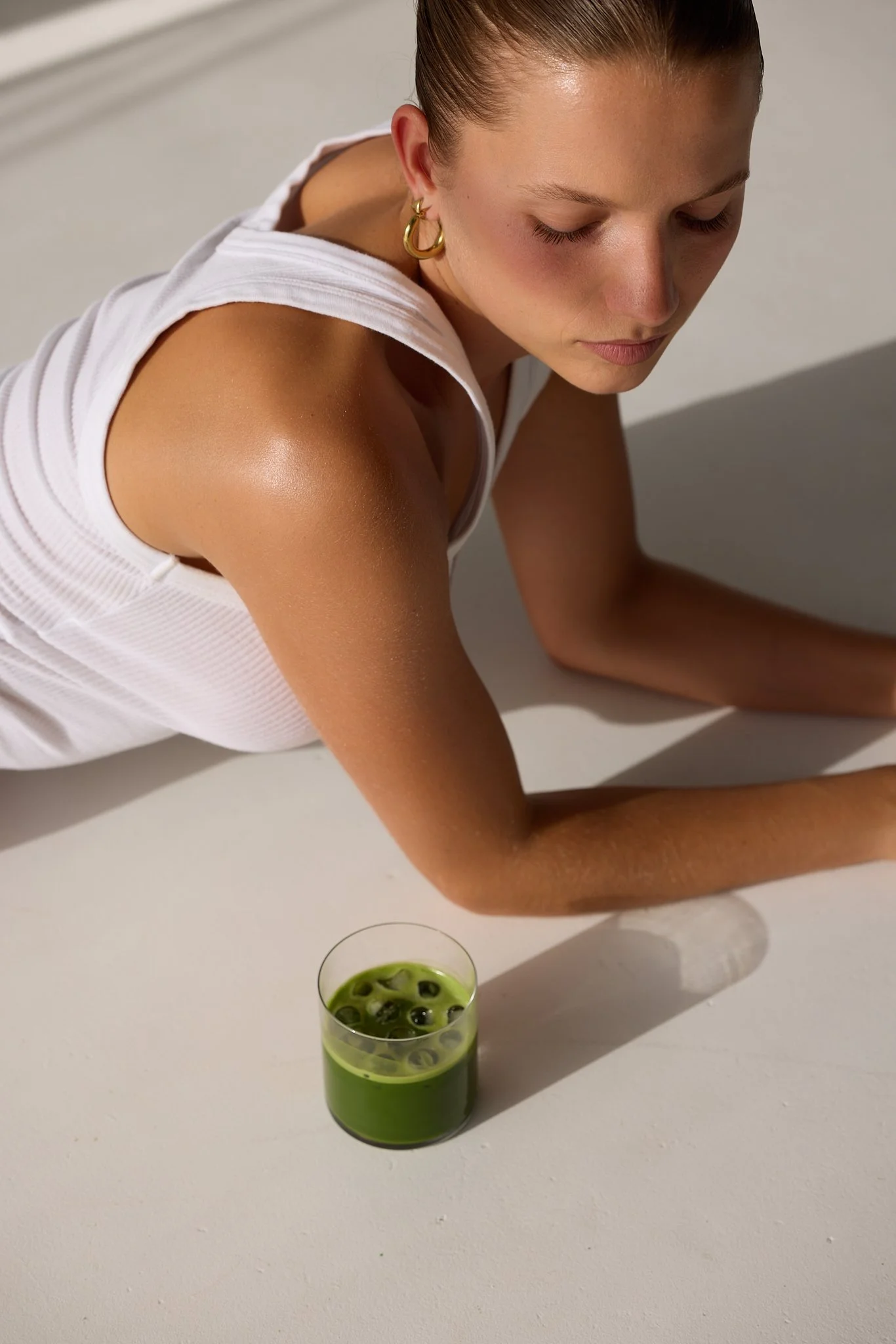 Editorial beauty portrait of model with ceremonial matcha – Byron Bay lifestyle brand photography