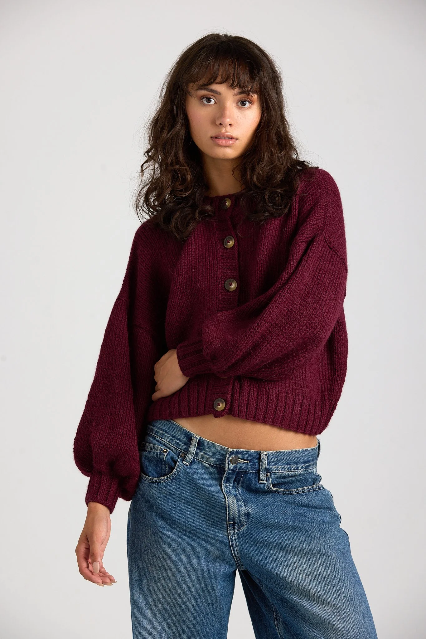 Editorial studio shot for First Born Knit, combining fashion and natural beauty