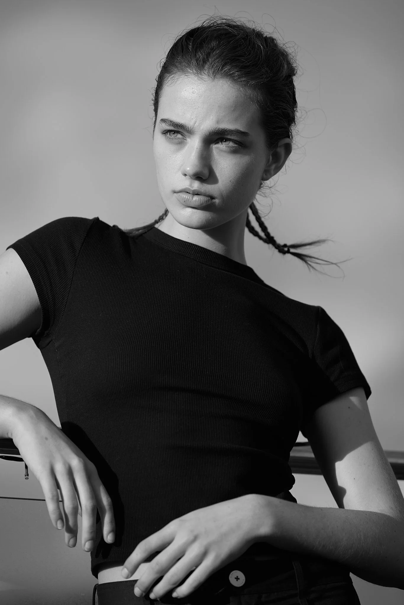 Close-up model portrait with refined styling and editorial beauty direction.