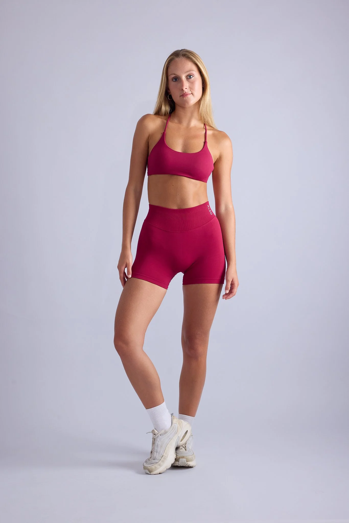 studio activewear photoshoot for ALSO brand featuring female fitness model, clean lighting and minimal styling in Byron Bay