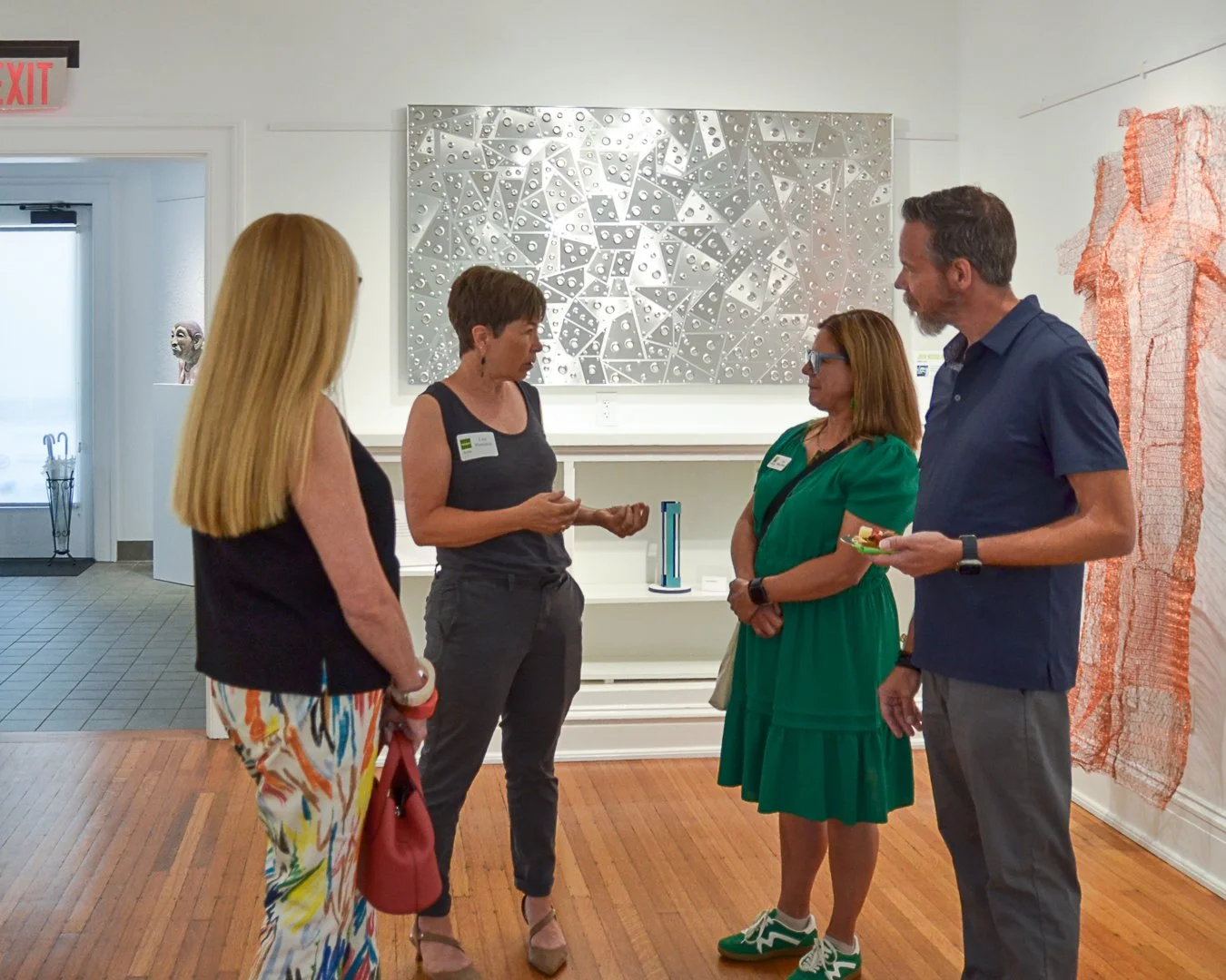 Conversations filled the galleries, connecting artists, visitors, and the works on view.