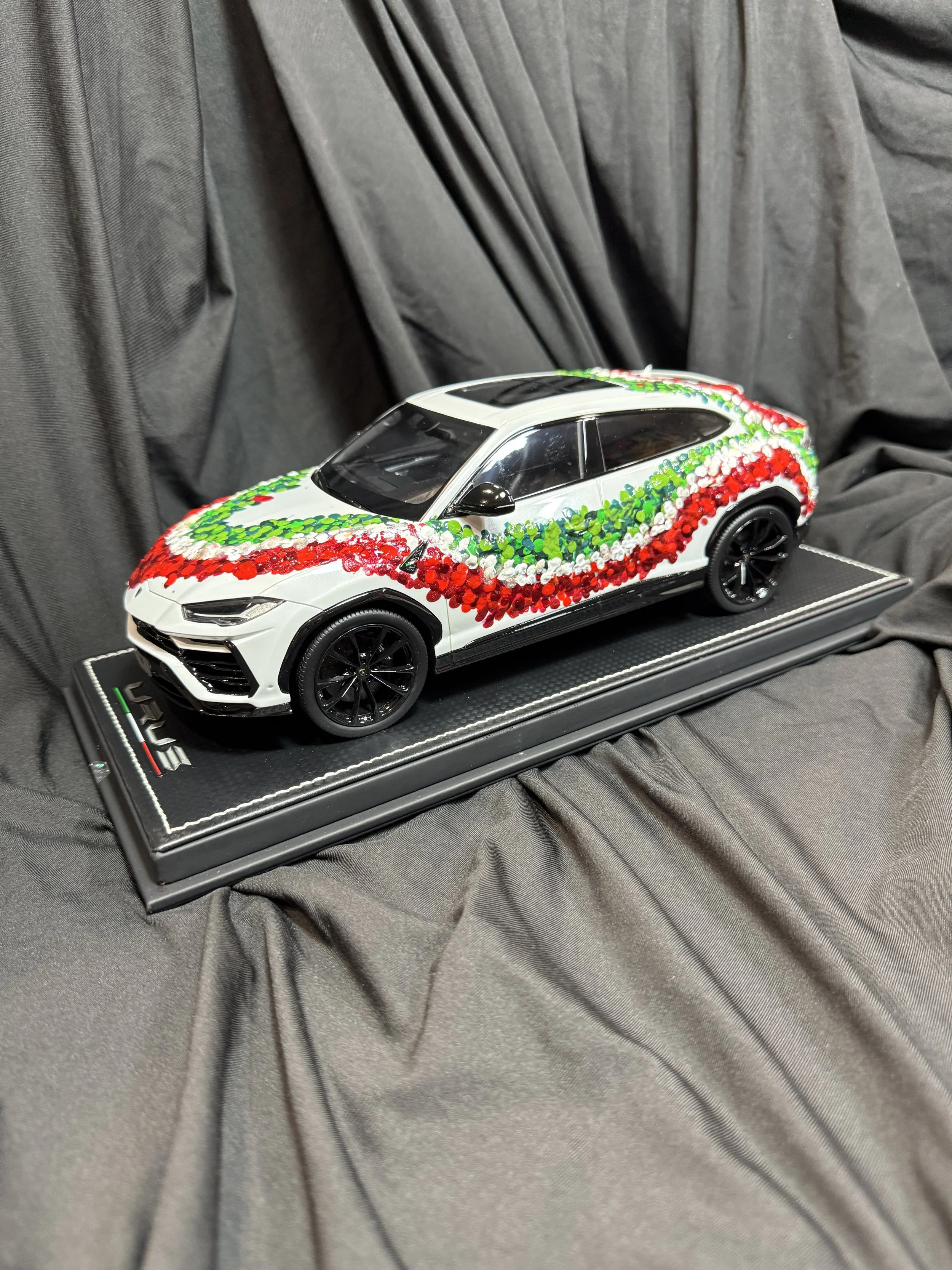  
   For the Love of Art and Cars Raffle prize 
   “Tricolore” 
   A one-of-a-kind hand-painted Lamborghini Urus model by artist Kelly Steller Hrad, transforming a collectible supercar into a distinctive work of art inspired by the colors and energy 
