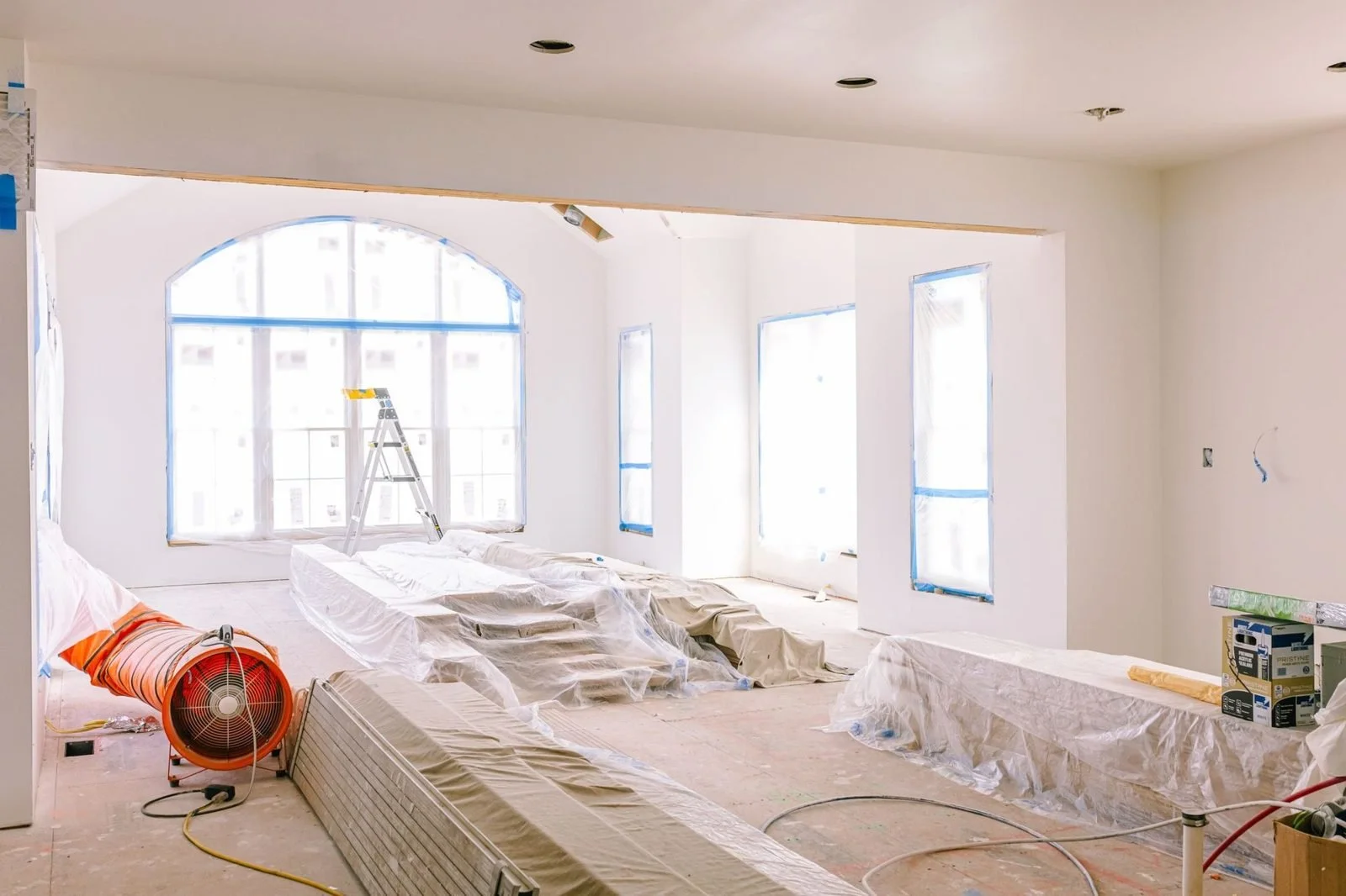 Great room with arched window in a Bucks County farmhouse addition