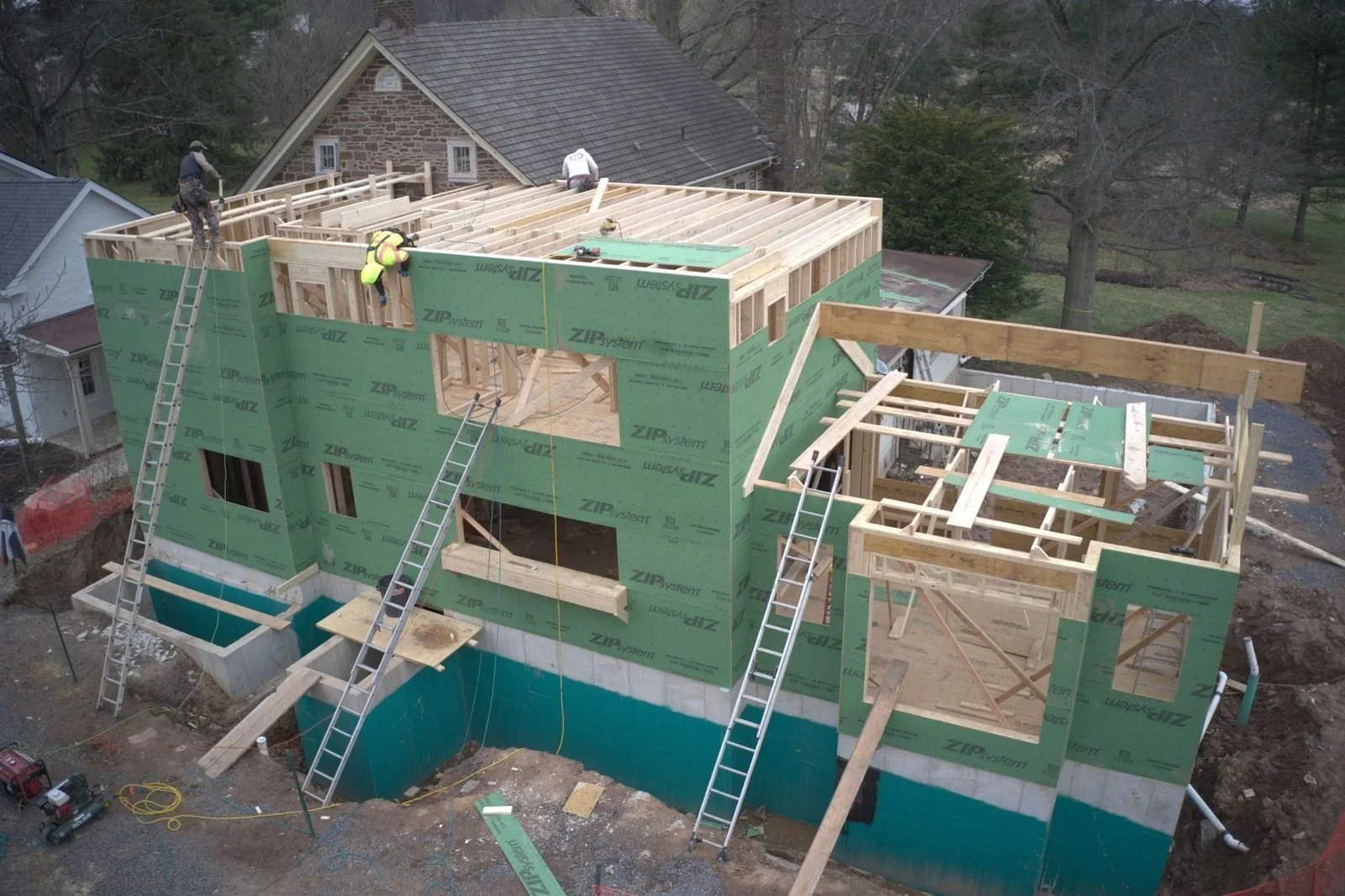 Second-floor framing and sheathing on a Bucks County farmhouse addition
