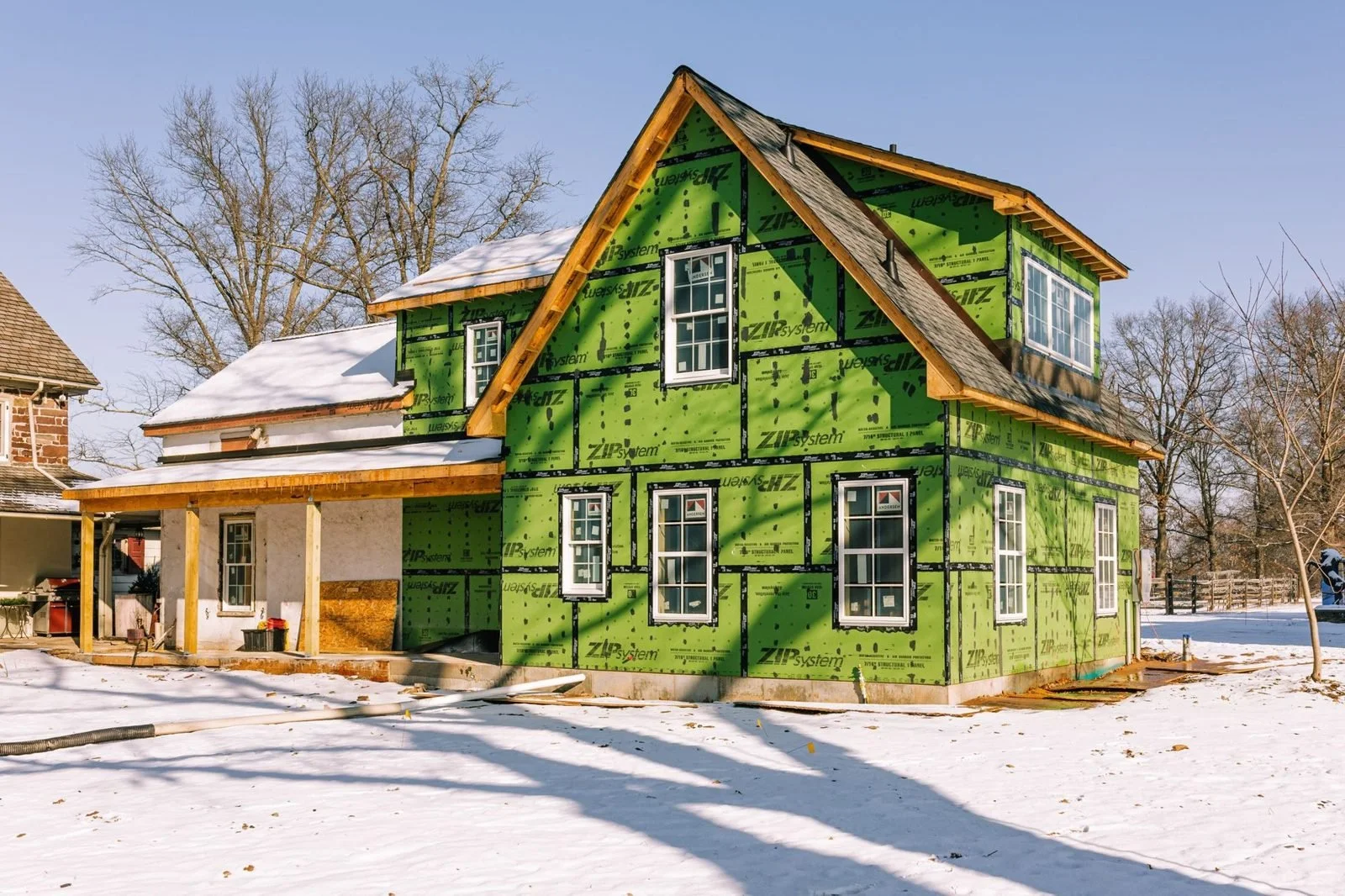 Weather-tight cottage addition in winter in Upper Bucks County
