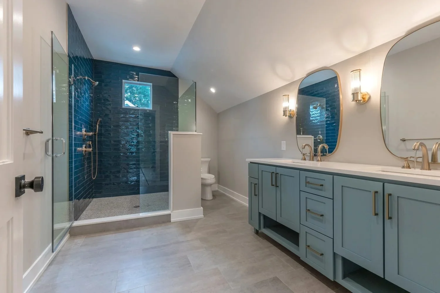 chestnut-hill-new-home-primary-bathroom-teal-vanity.jpg