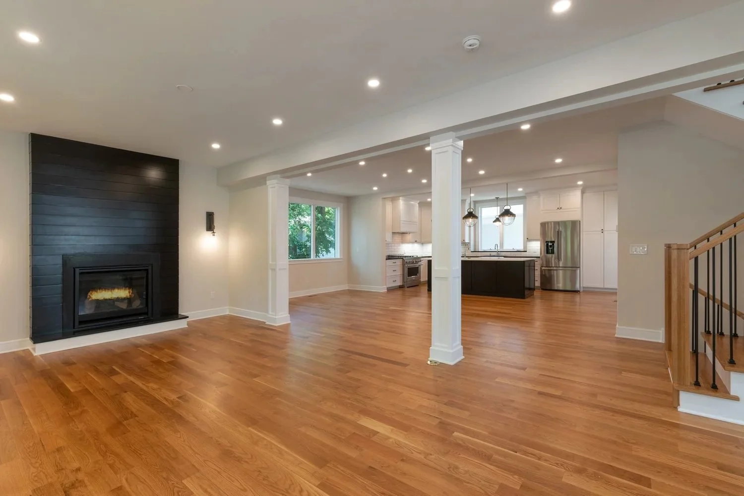 chestnut-hill-new-home-open-living-room-fireplace.jpg