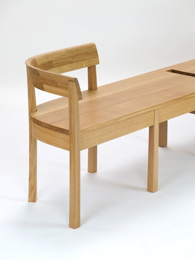 Gallery bench with curved backrest