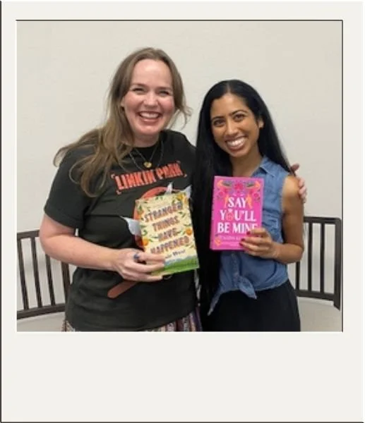 Authors holding their books