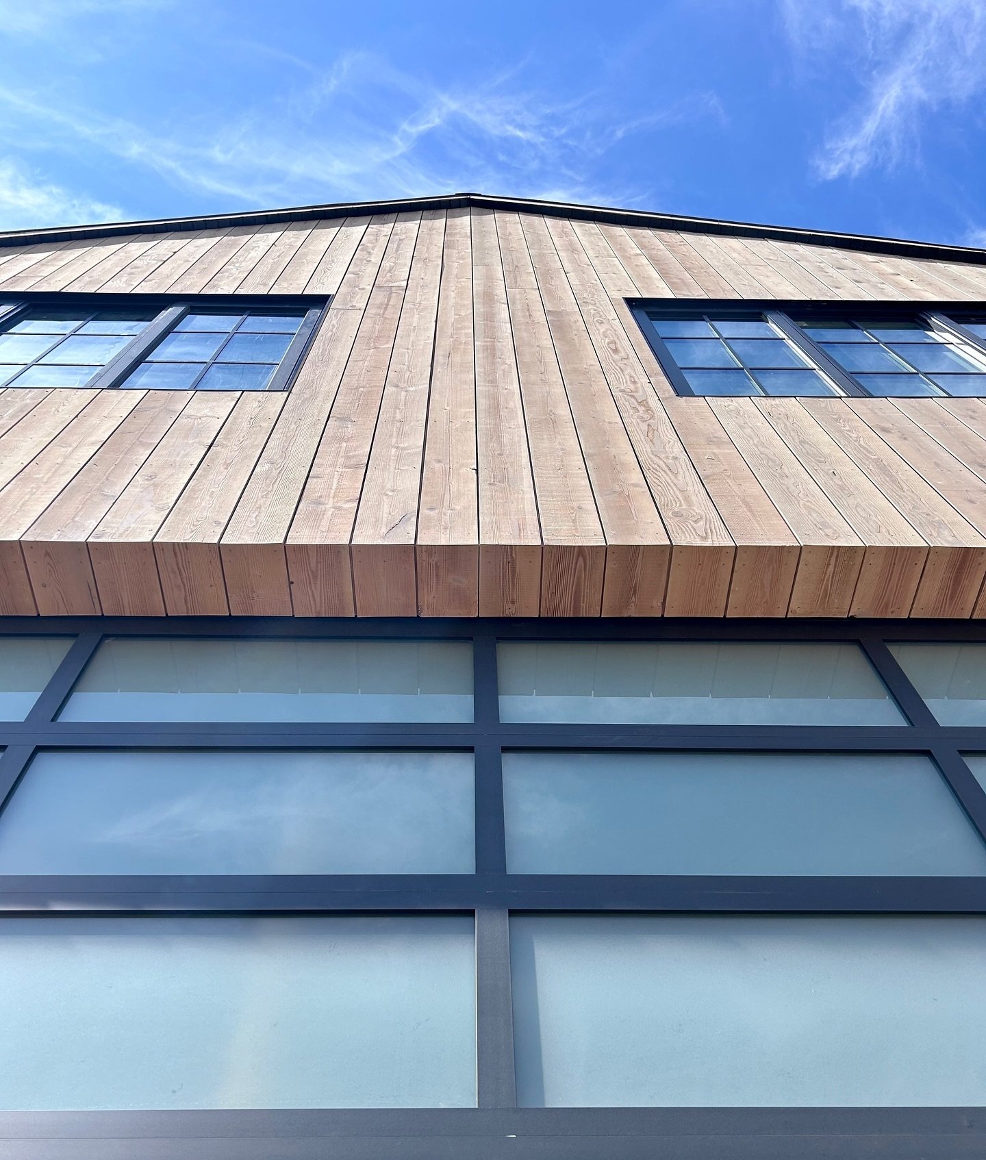 Clean lines on this mitered corner trim element. Douglas Fir is an amazing product for exterior siding. The stain choice here shows off the natural grains. 

Builder - @pointsnorthbuild 

REAL WOOD PRODUCTS - Siding | Timbers | Box Beams | Flooring |