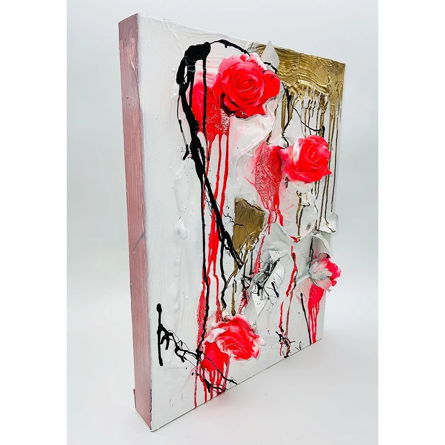 Mixed media abstract artwork with textured white background, red 3D roses, black dripping paint, and gold accents.