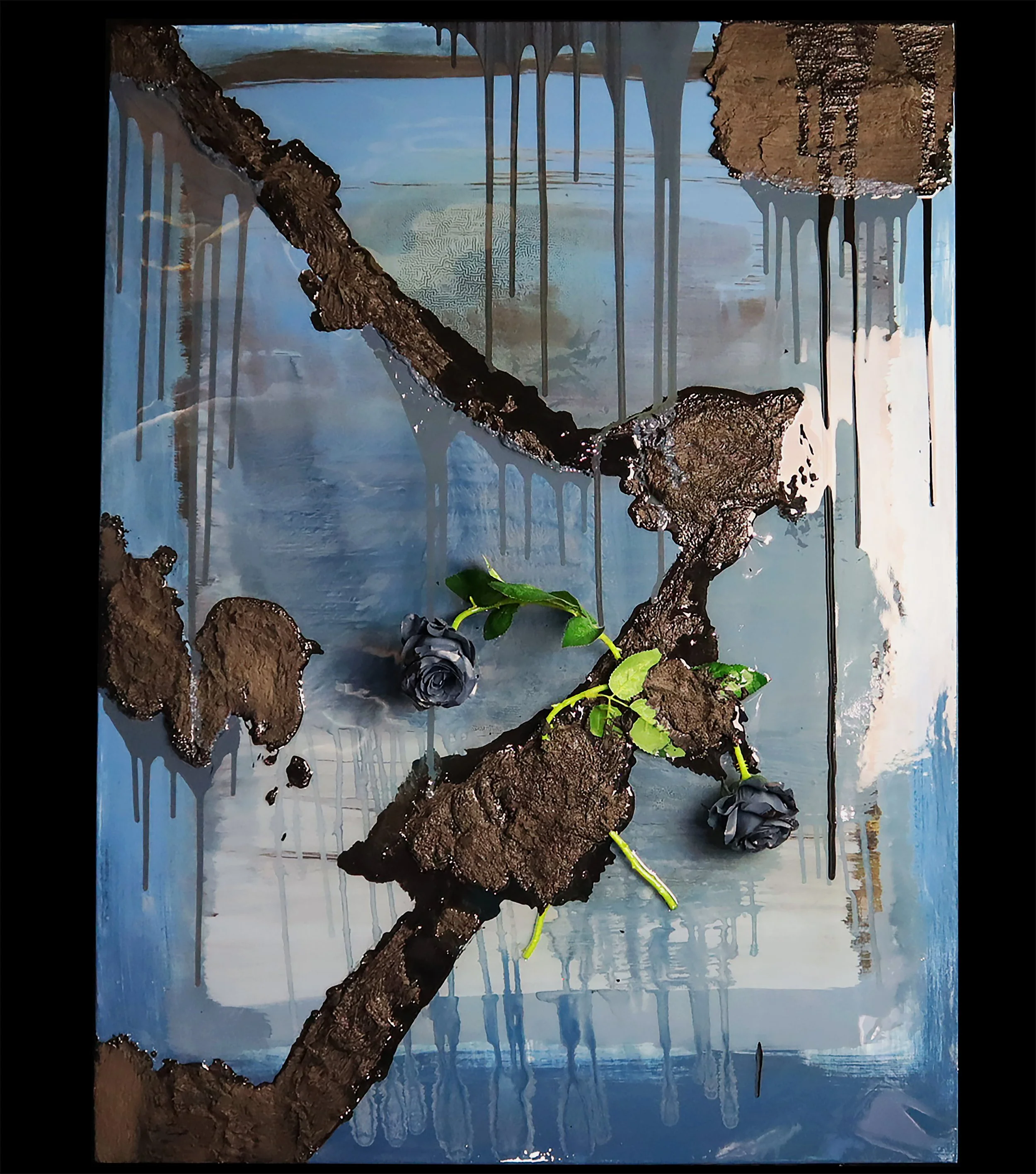 A mixed-media artwork featuring dark textured elements resembling soil or charcoal, with two black roses and green leaves placed on top, set against a background of blue and gray abstract paint with dripping effects.