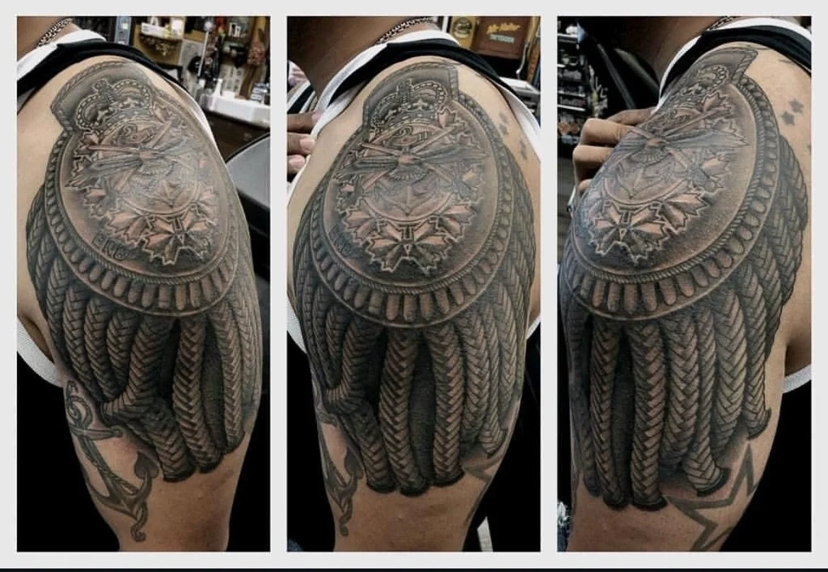 Epaulette by @loganhowardtattooer To book with Logan, message him directly.