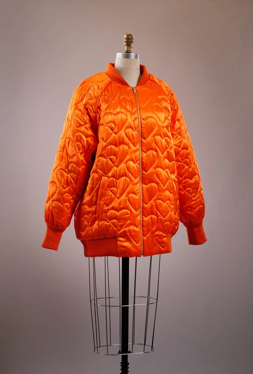 Orange_Quilted_Jacket_Three_Quarters_Front_web.jpg