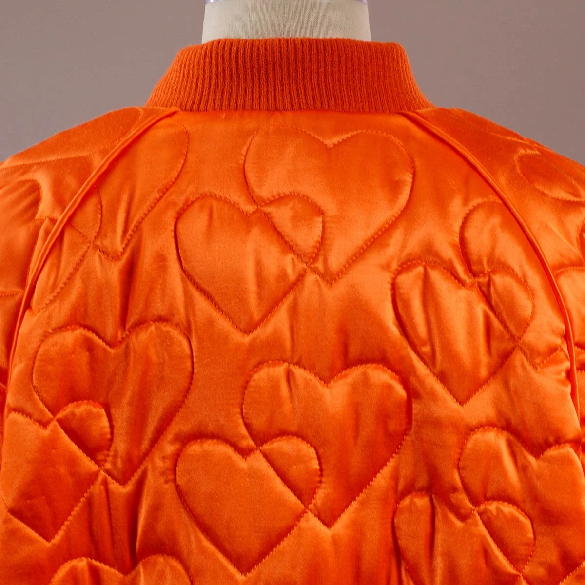 Orange_Quilted_Jacket_Back_Detail_web.jpg