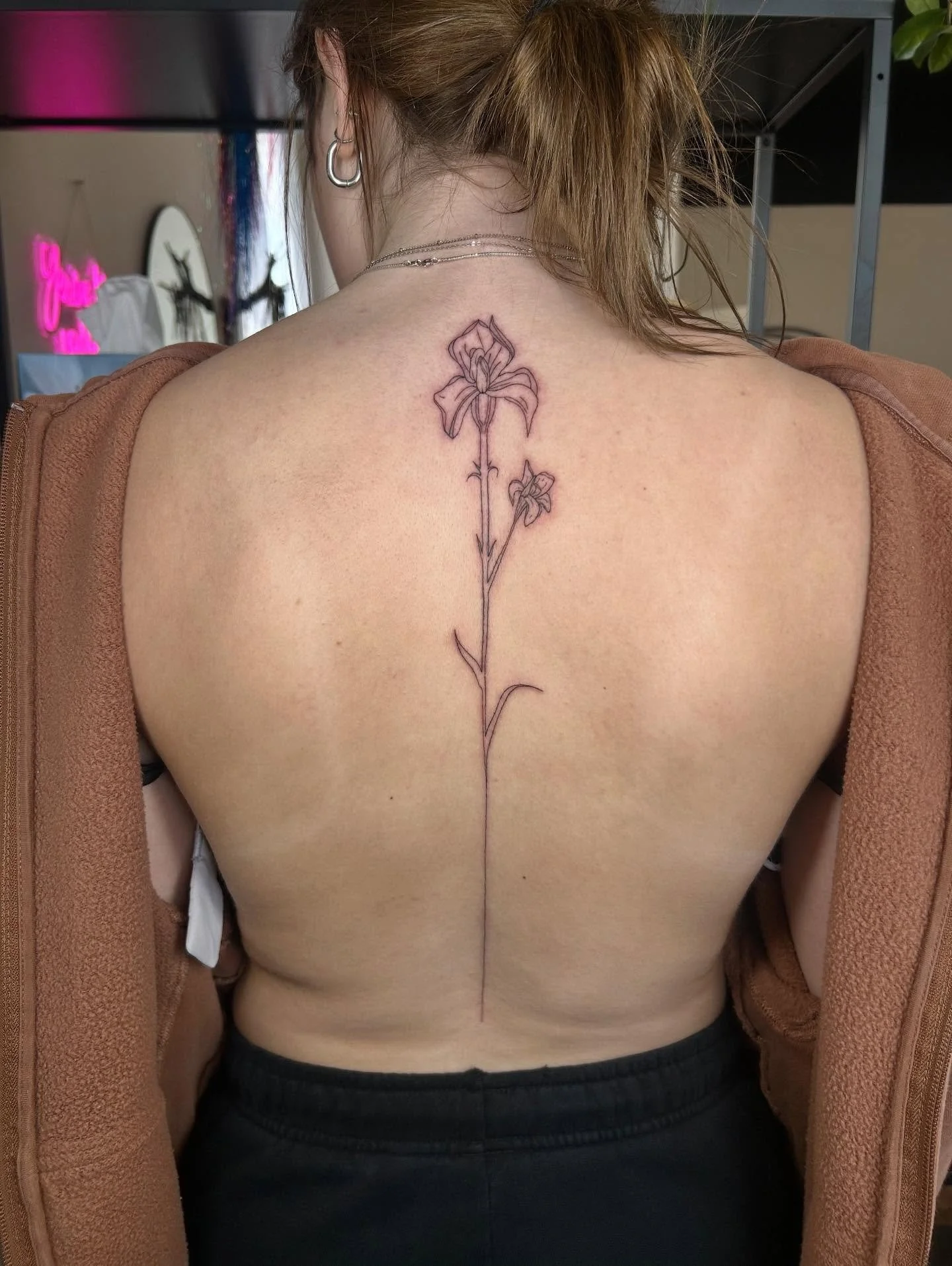 A beautiful iris flower for my beautiful bestie #sanctuarystudio #yqr #yqrtattoo #yqrtattoos #tattoo #tattoos #tattooapprentice #tattooartist #iris #irisflower #irisflowertattoo #flowertattoo #spinetattoo