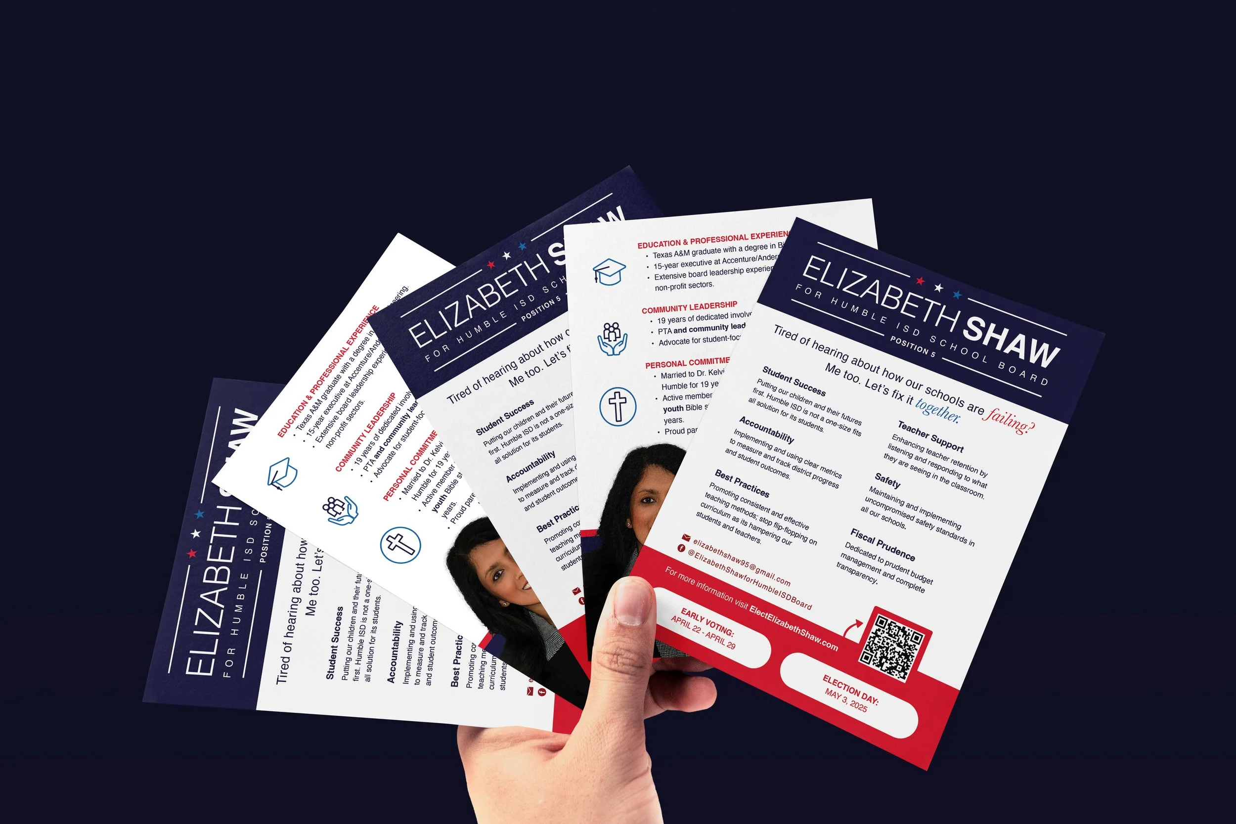 Hand holding three election campaign flyers for Elizabeth Shaw, a candidate for Humphrey ISD School Board, against a dark background.