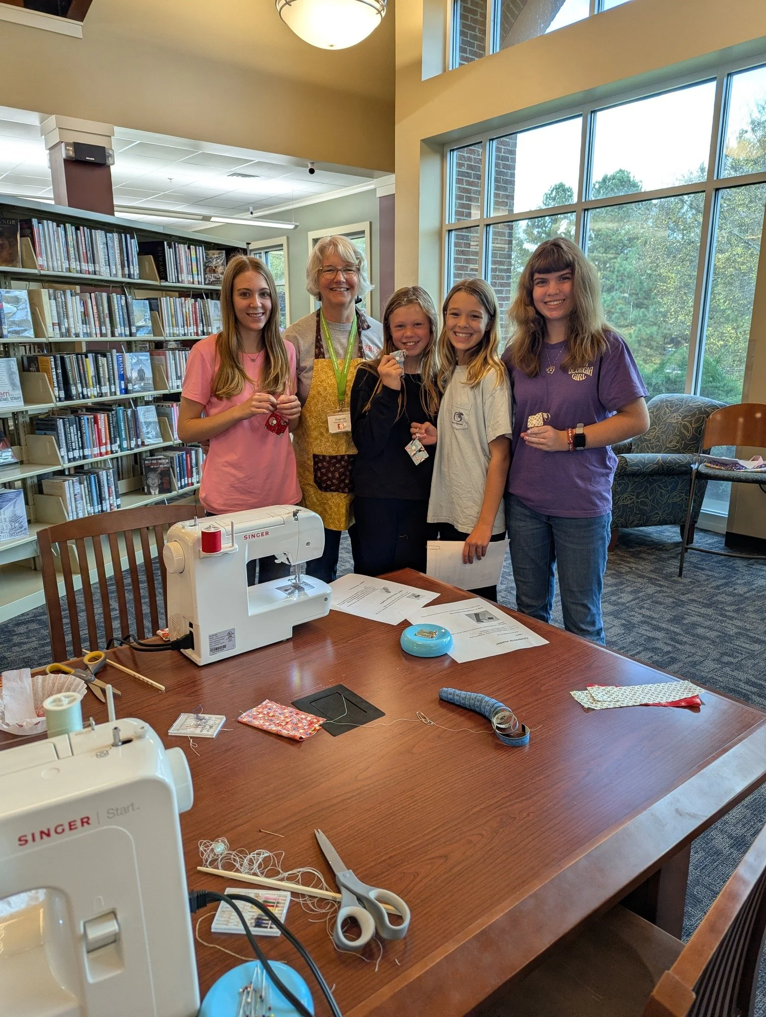 Teens at sewing class