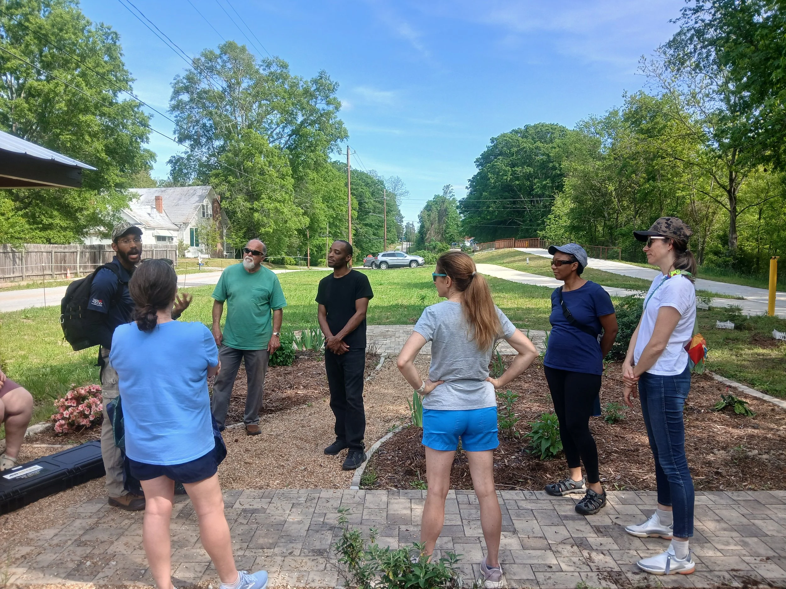 group standing outside the library at an arborist program