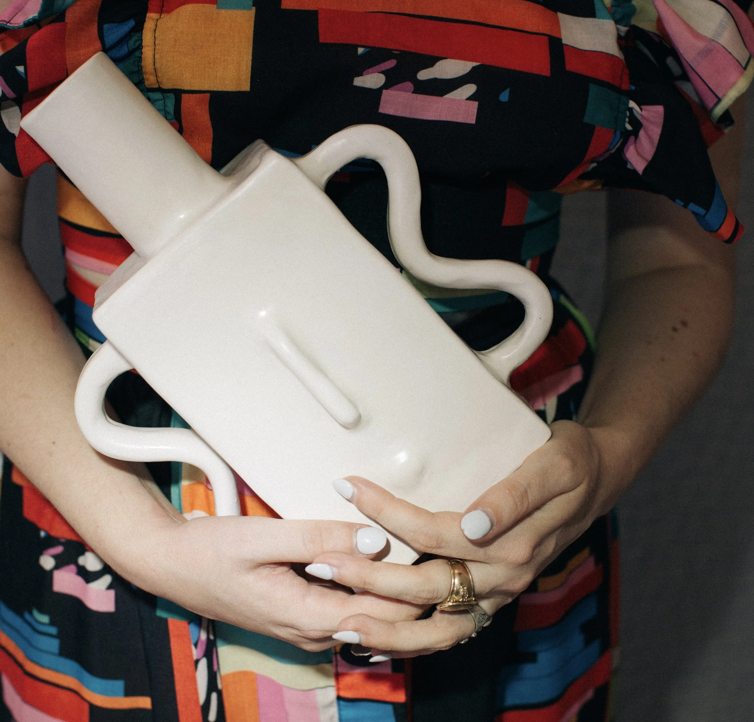 white block face vase