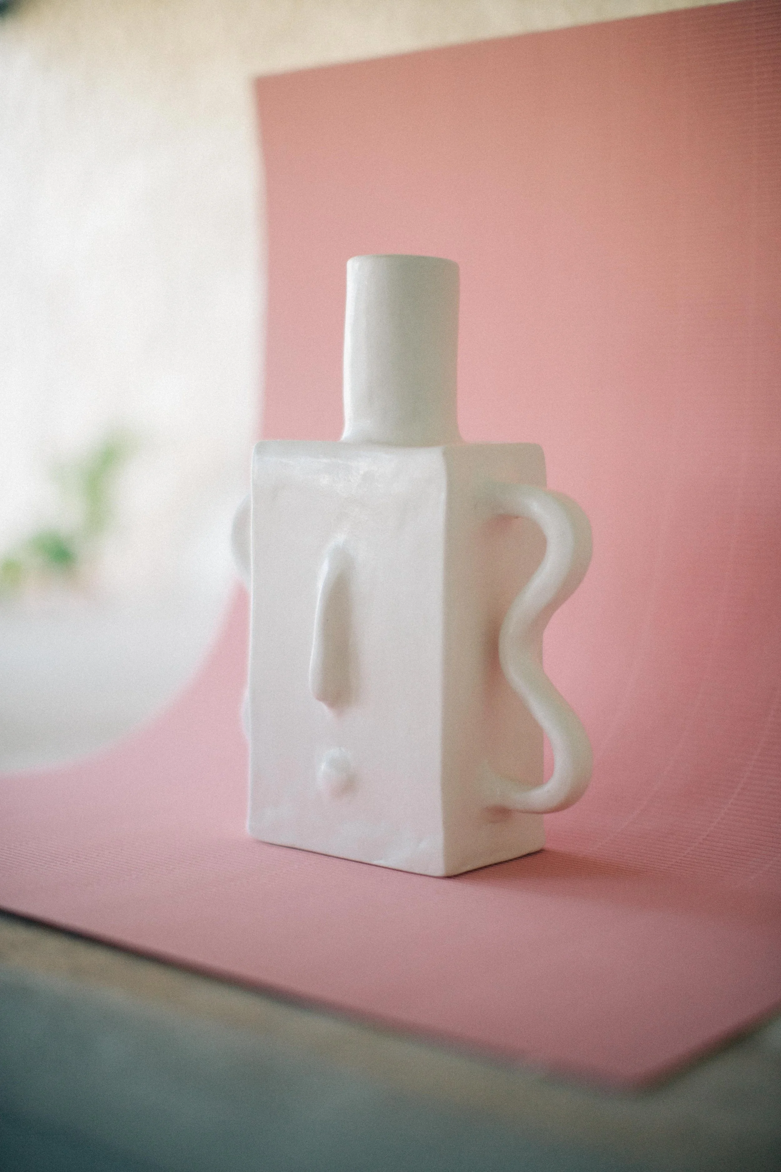 white block face vase