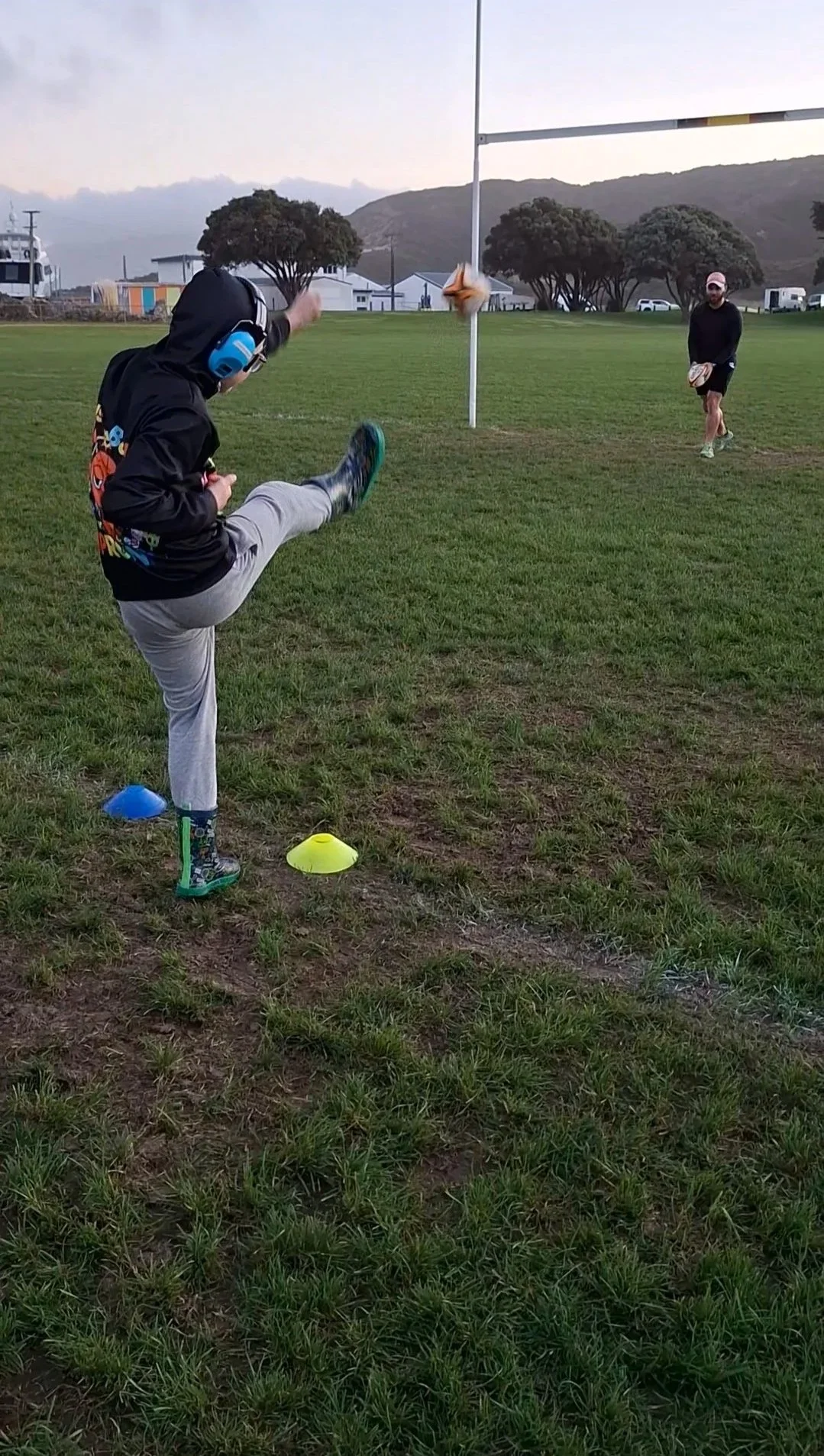 kicking+with+ear+defenders.jpg