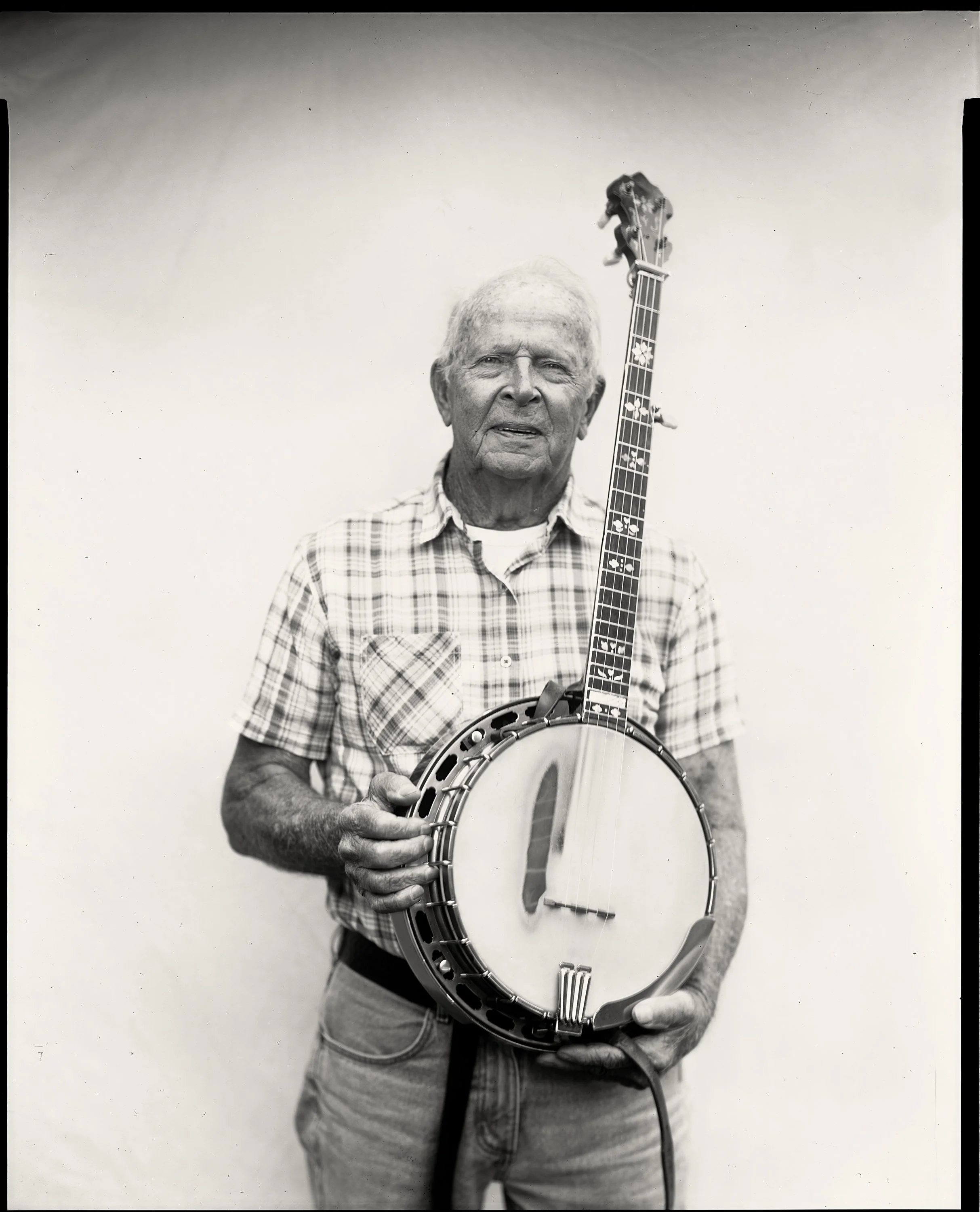 Intimate 8x10 paper negative portrait of a traditional performer at the Bluff Mountain Music Festival, photographed by Parker J. Pfister.