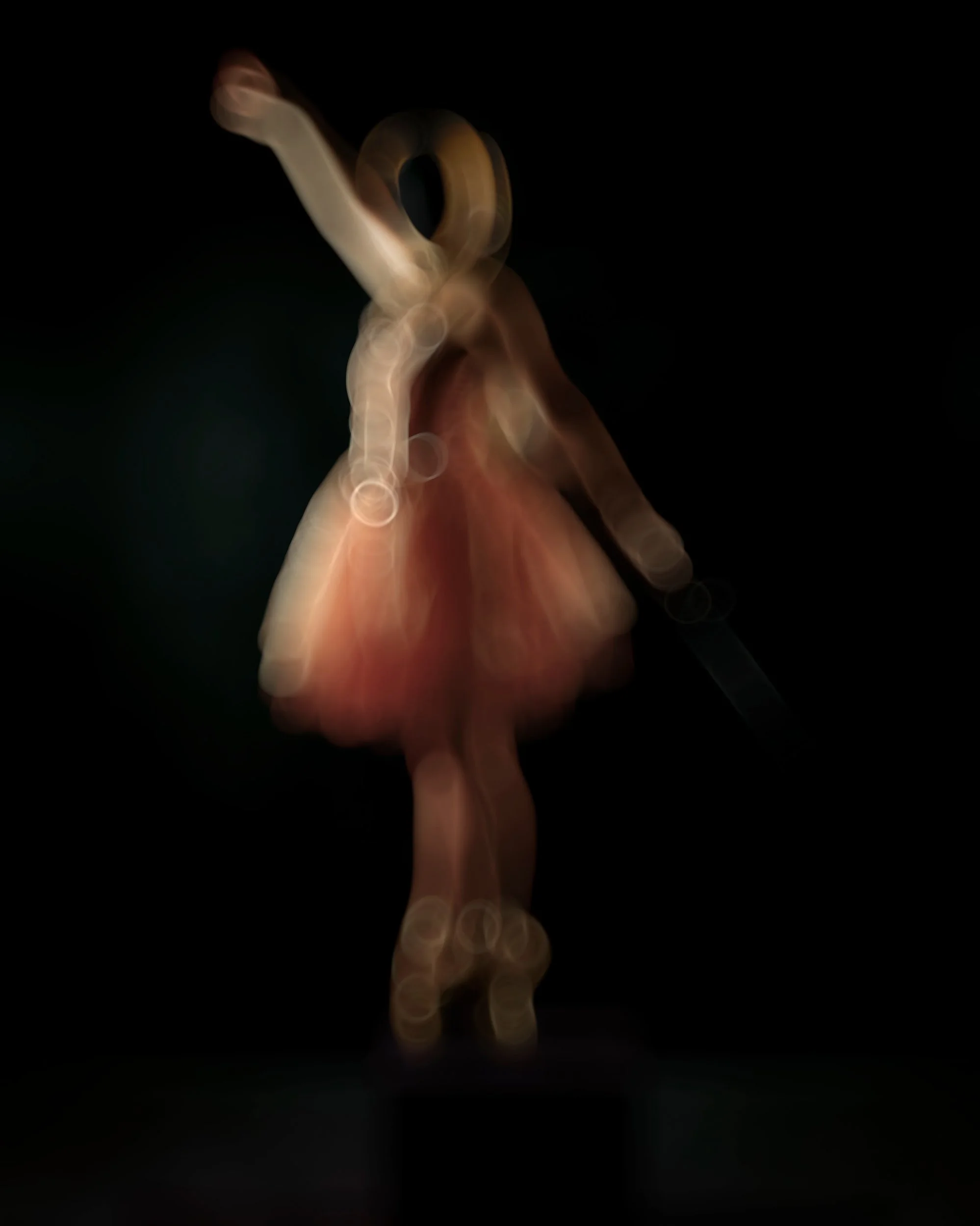 A beautiful, atmospheric portrait rendered completely out of focus to emphasize soft, glowing forms and dreamlike textures through alternative photographic processes.