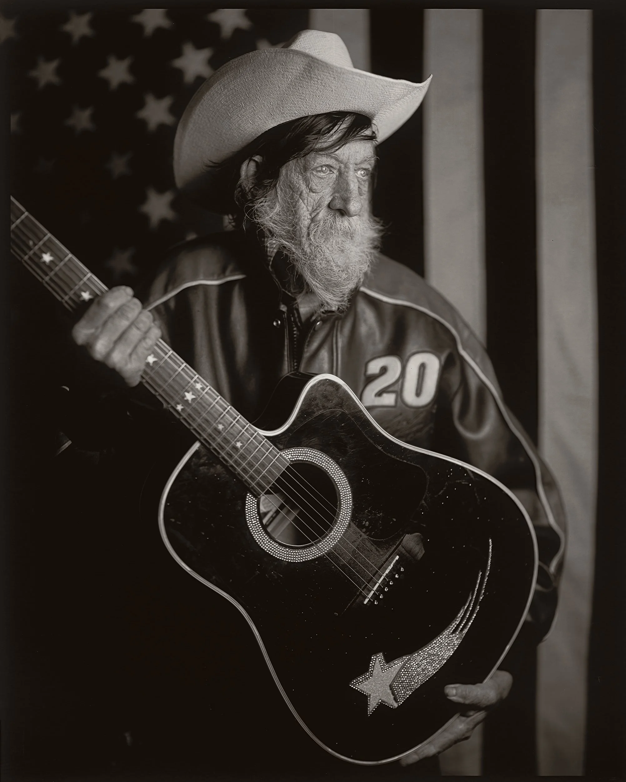 Intimate 8x10 paper negative portrait of an Appalachian musician during Bluegrass Night at the Old Depot in Marshall, North Carolina, photographed by Parker J. Pfister.