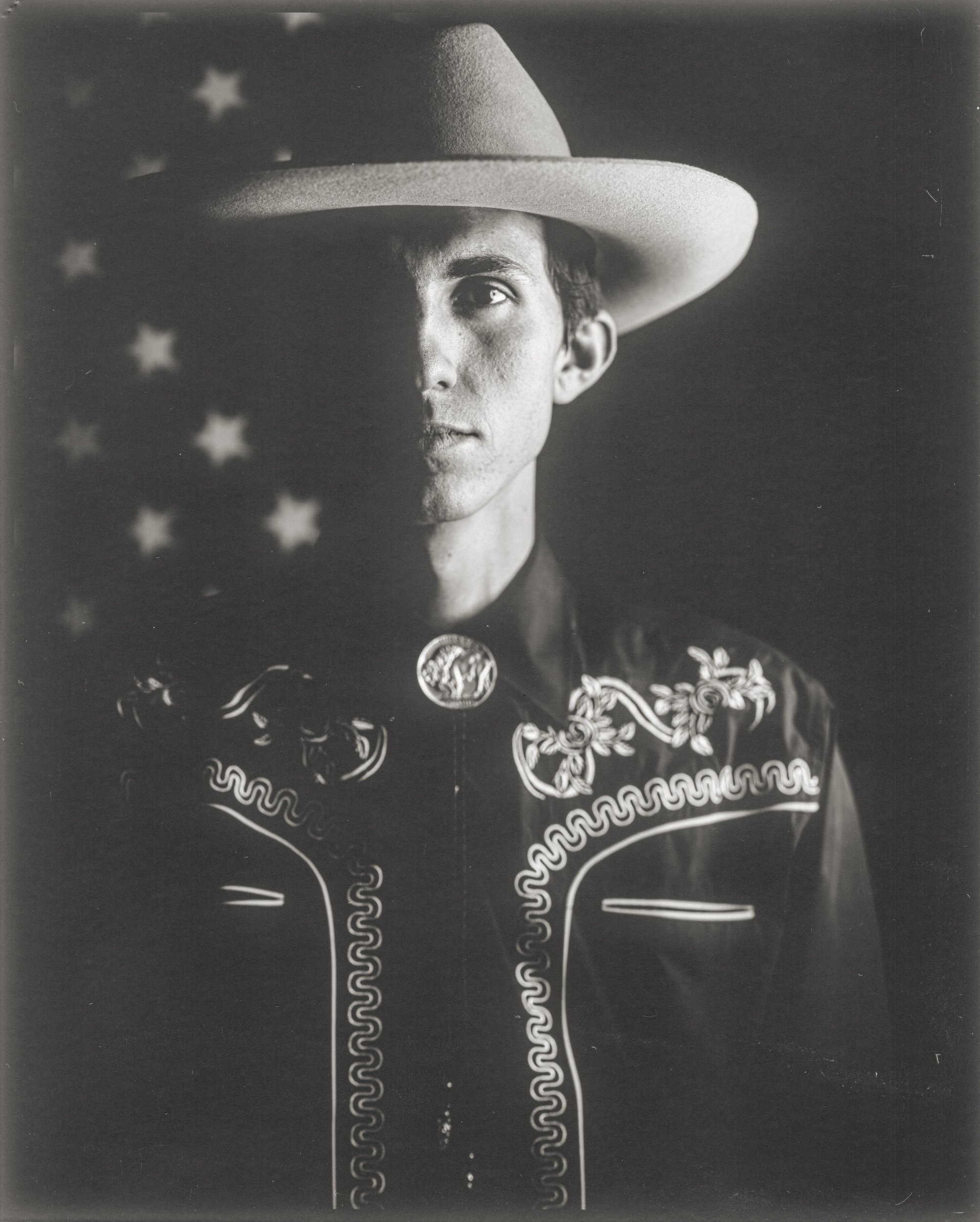 Large format 8x10 paper negative portrait of a musician captured during Bluegrass Night at the Old Depot in Marshall, North Carolina, photographed by Parker J. Pfister.