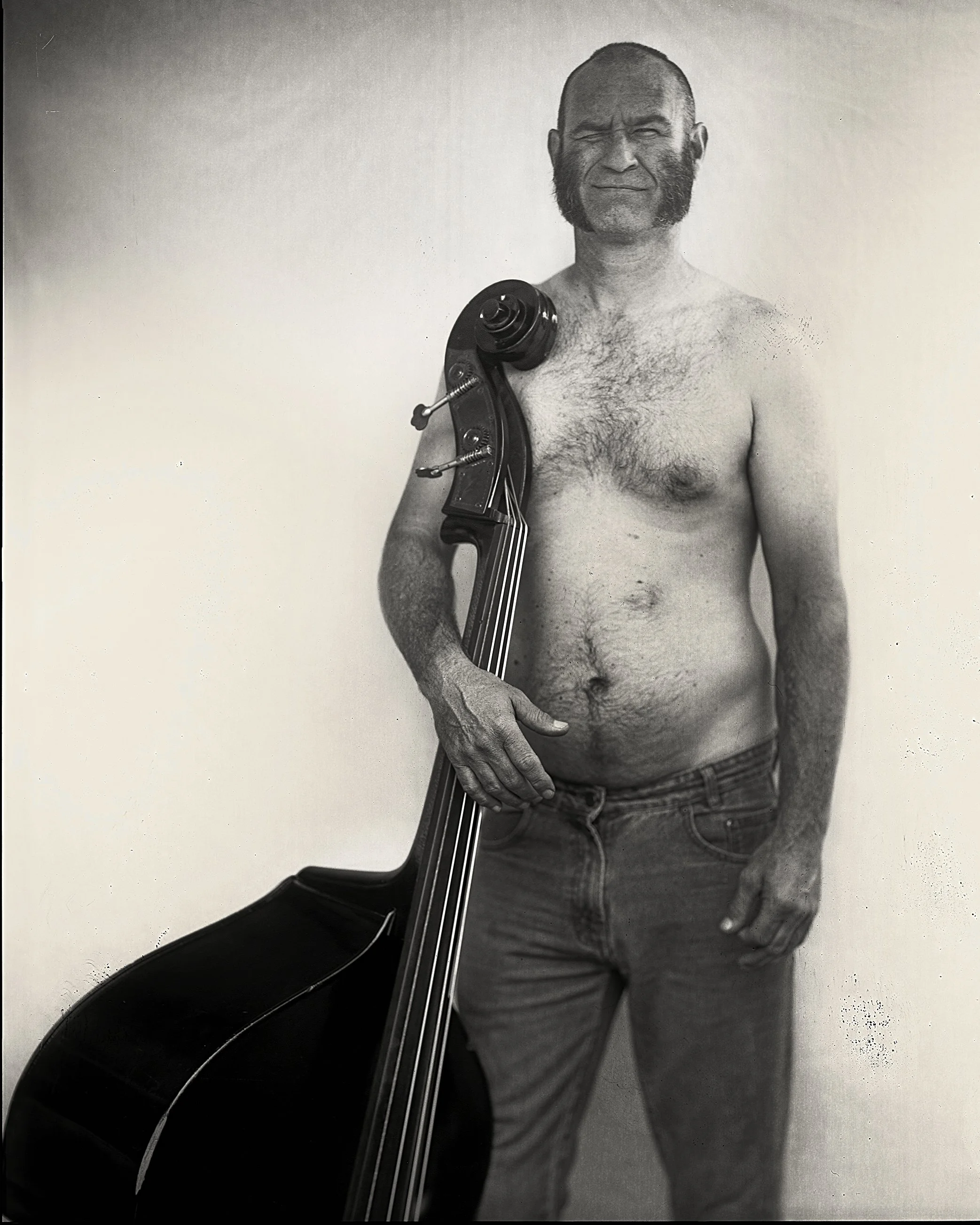 Striking 8x10 paper negative portrait made on-location during the Bluff Mountain Music Festival in Madison County, NC, photographed by Parker J. Pfister.