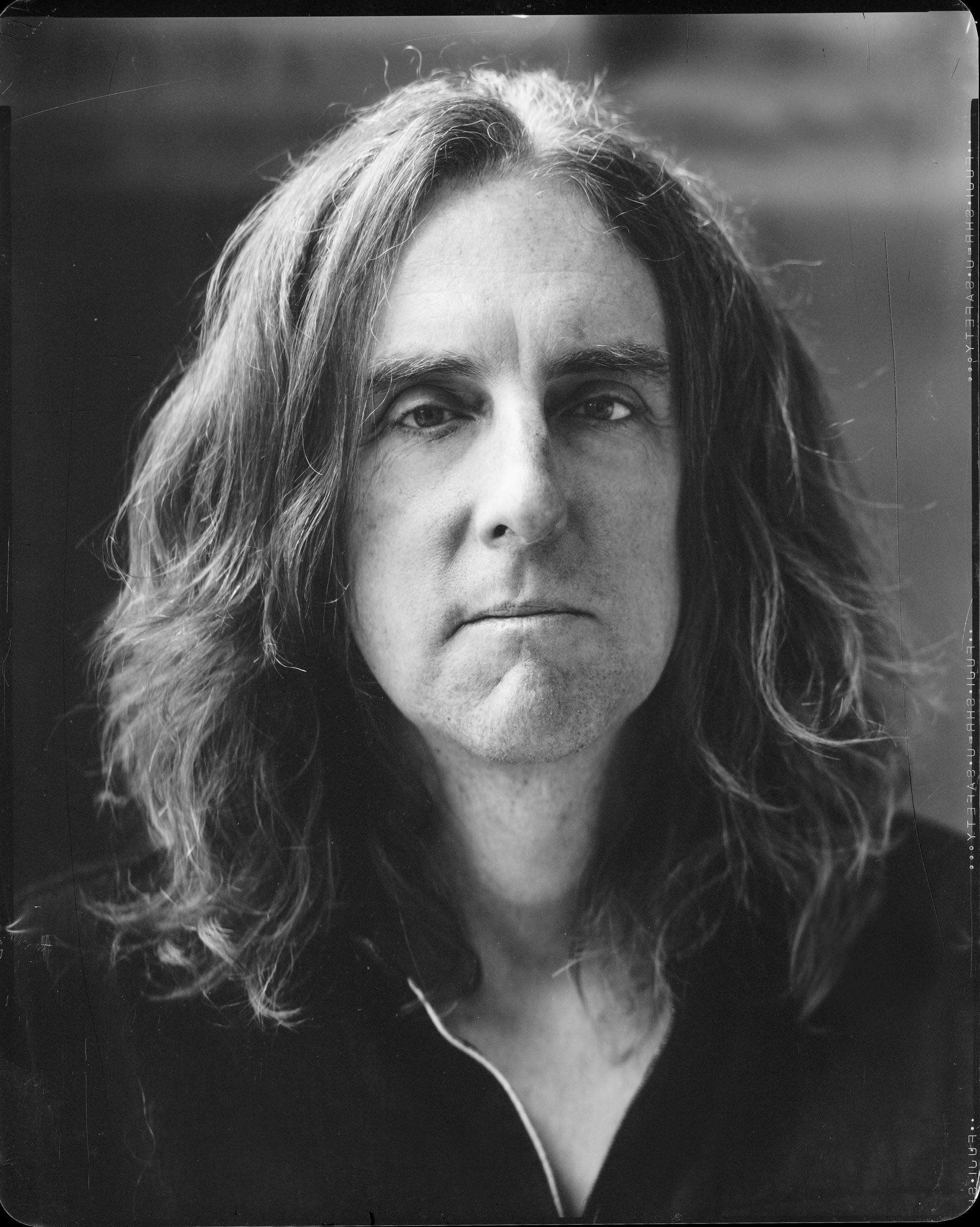 Black and white portrait of musician Carl Broemel, guitarist for My Morning Jacket, captured by Parker J. Pfister.