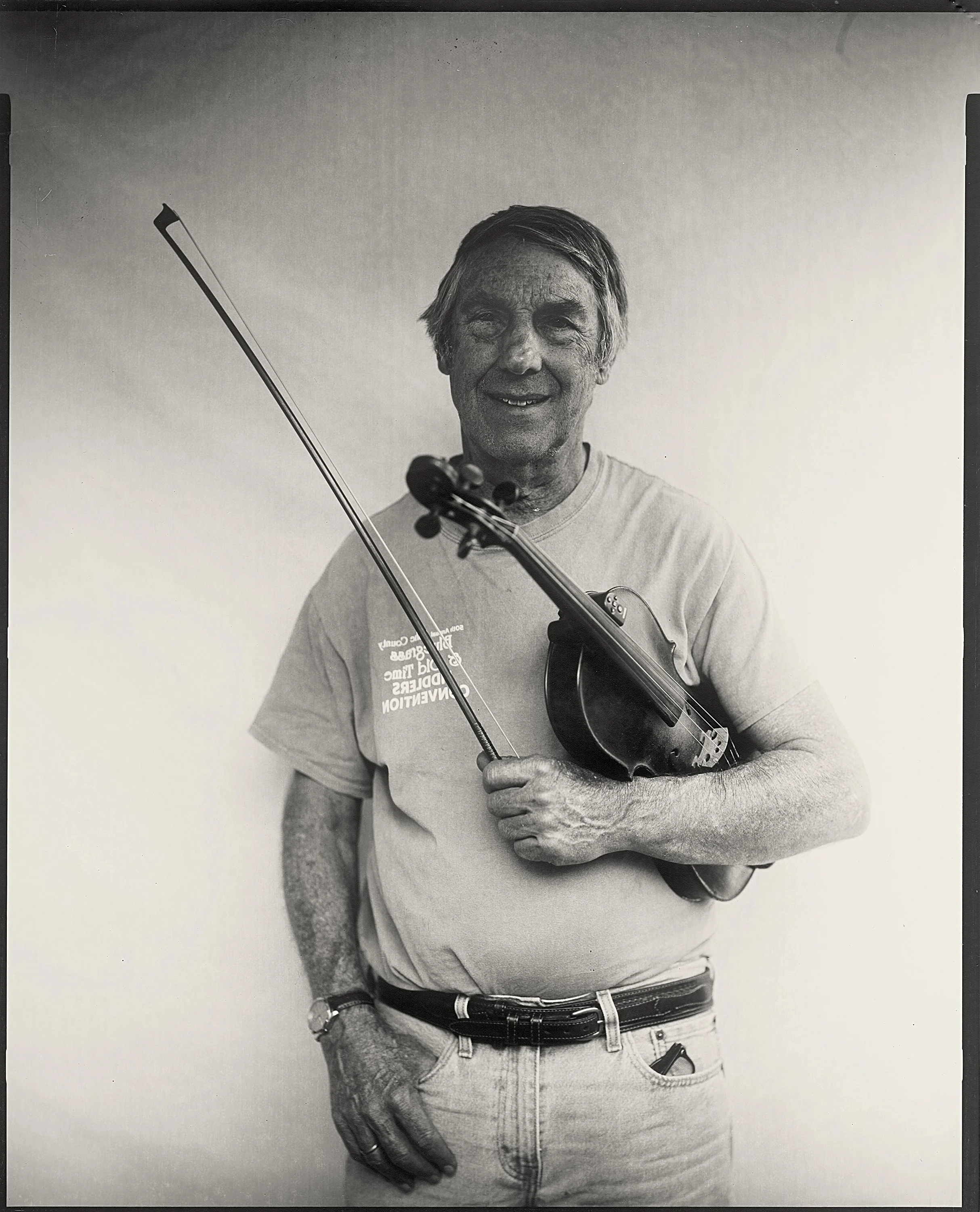 Fine art 8x10 paper negative portrait of a performer at the historic Bluff Mountain Music Festival, photographed by Parker J. Pfister.