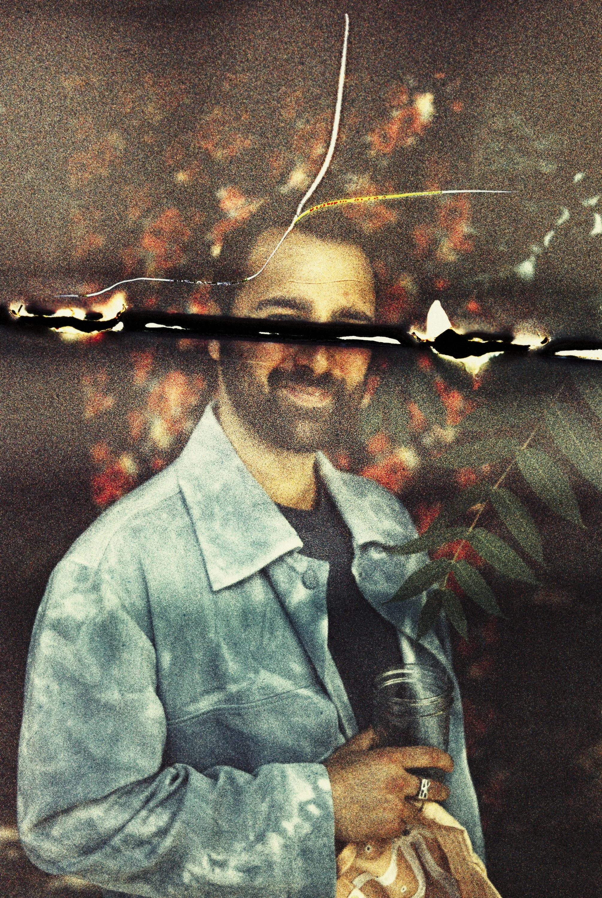 Distressed color 35mm film portrait featuring musician of I Give My Friends Flowers in a blue denim jacket with warm textured light leaks, photographed by Parker J. Pfister.