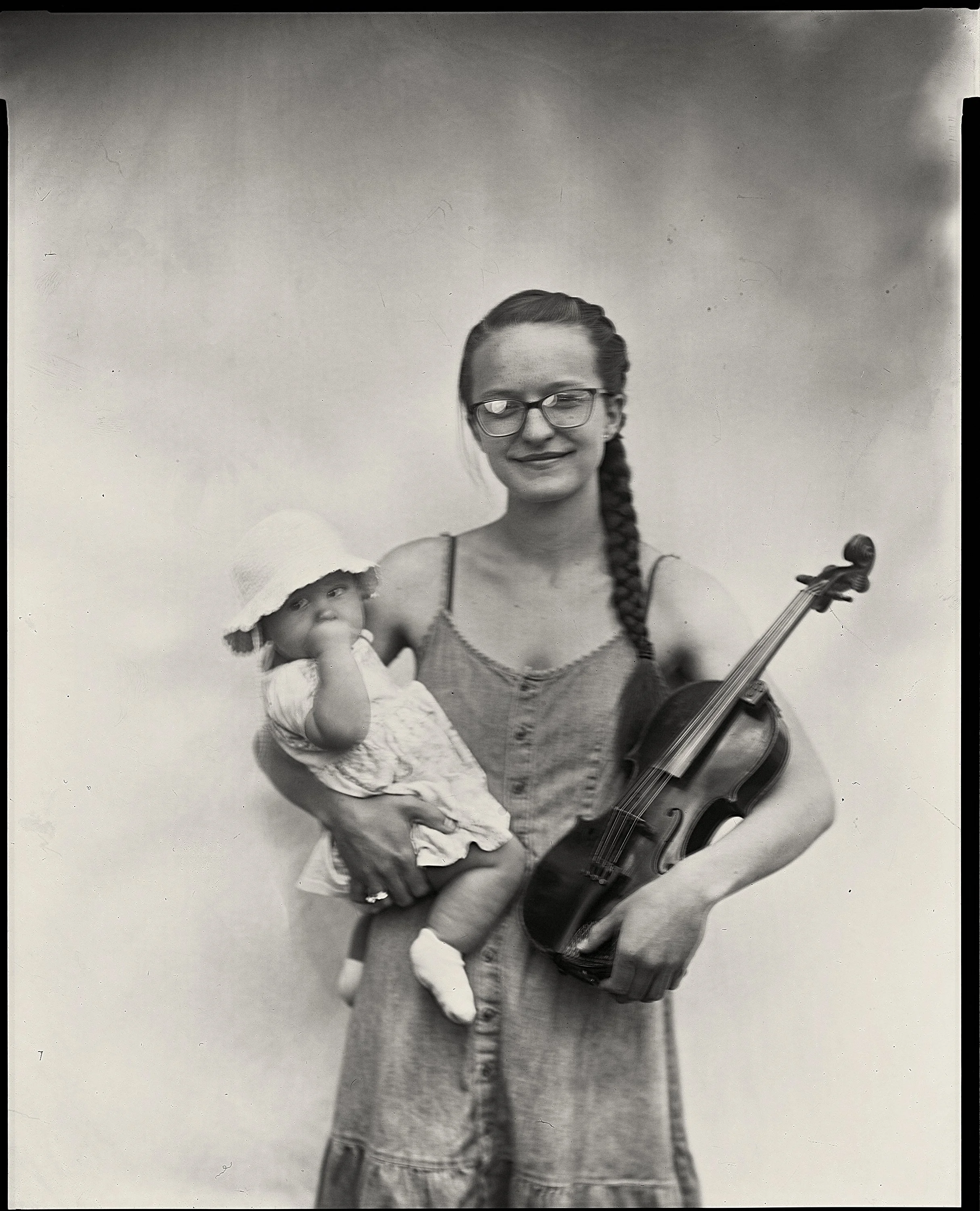 Atmospheric 8x10 paper negative fine art portrait of an Appalachian musician at Bluff Mountain Music Festival, photographed by Parker J. Pfister.
