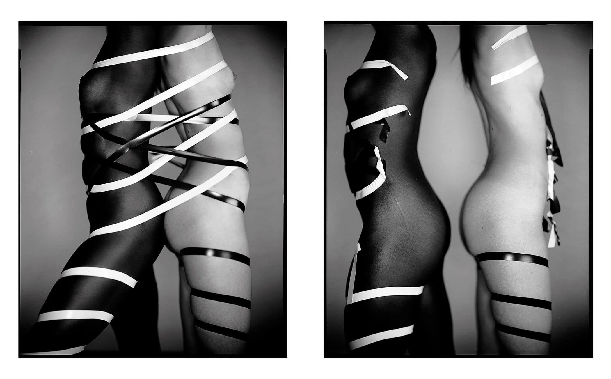 Parker J Pfister Fine Art Black and White Constraint Portrait of two images of a nude black and white woman bound together with black and white tape in one image, and the tape broken in the other.