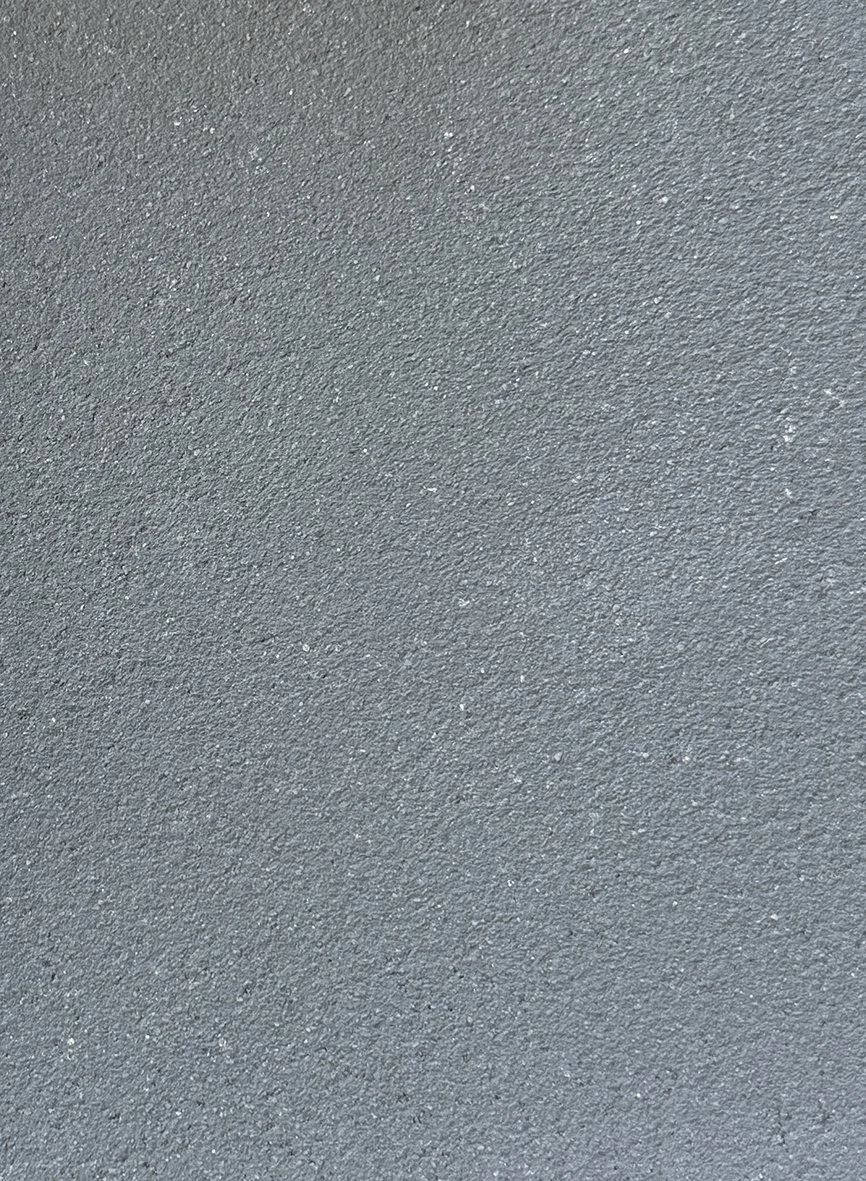 Grainy course grey texture clay plaster surface