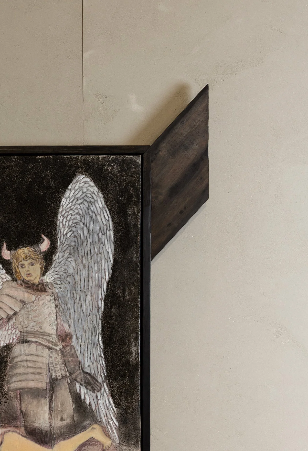 Detail of artwork on textured grey ambitec panels