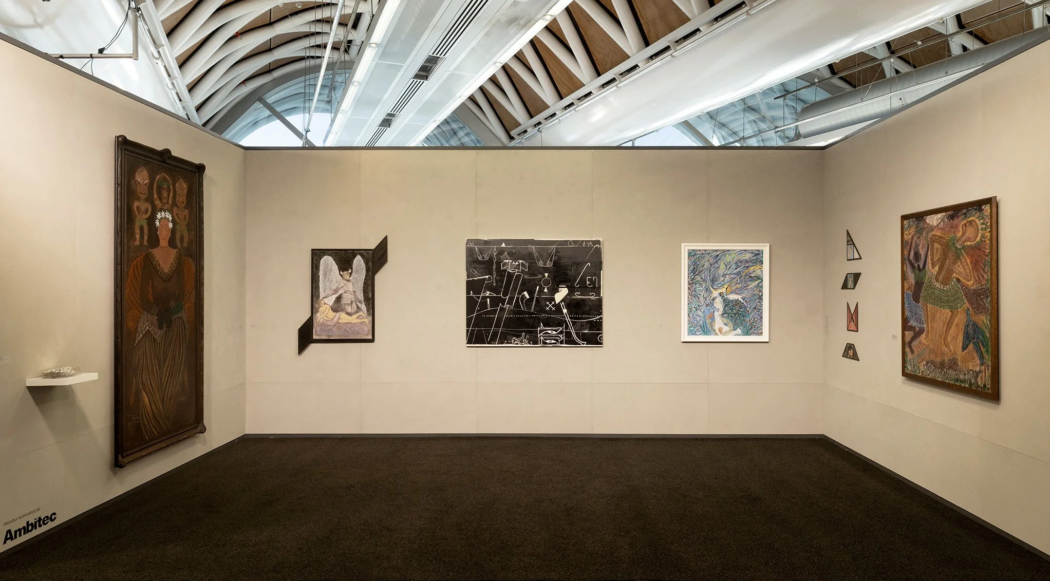 Art gallery booth with textured grey panels