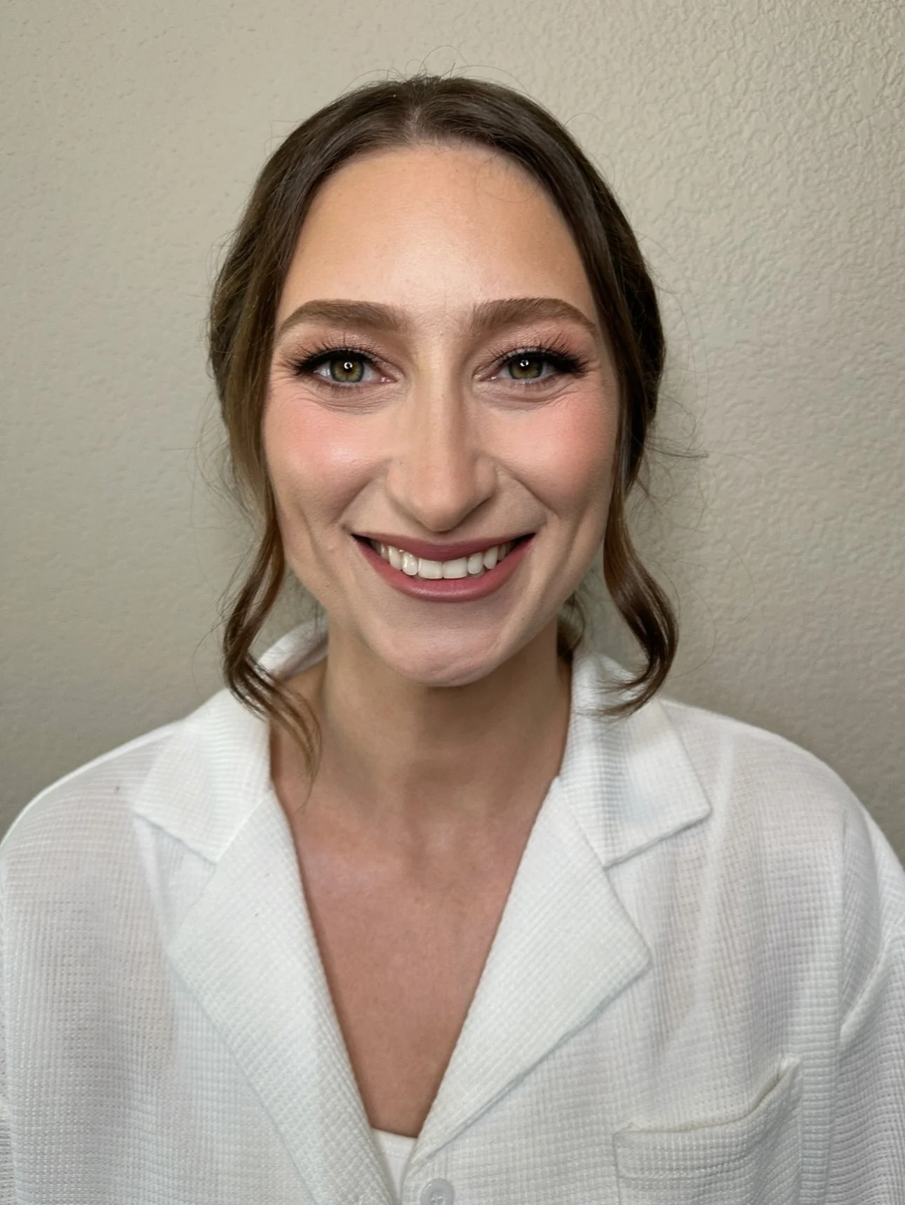 timeless ,makeup look with a low bun